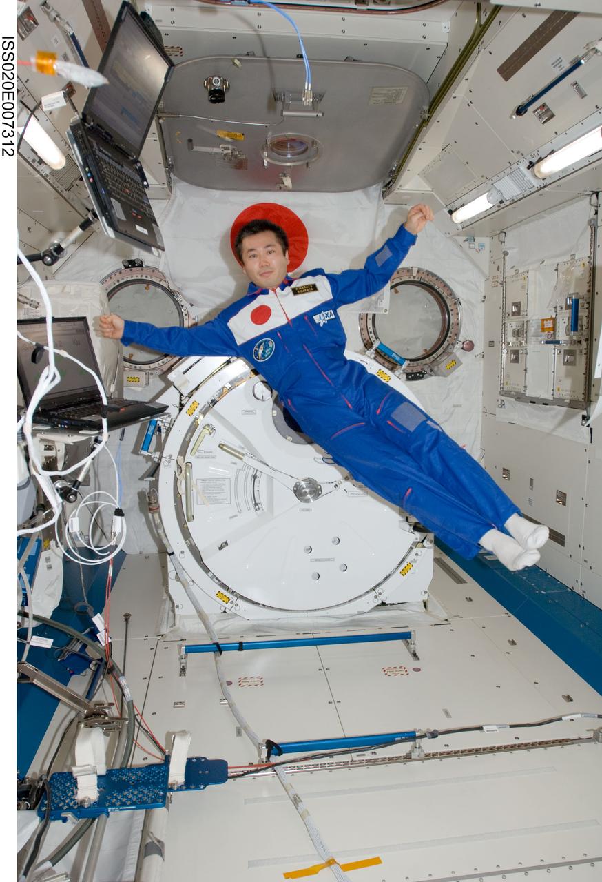 ISS020-E-007312 (3 June 2009) --- Japan Aerospace Exploration Agency (JAXA) astronaut Koichi Wakata, Expedition 20 flight engineer, poses for a photo while floating freely in the Kibo laboratory of the International Space Station.