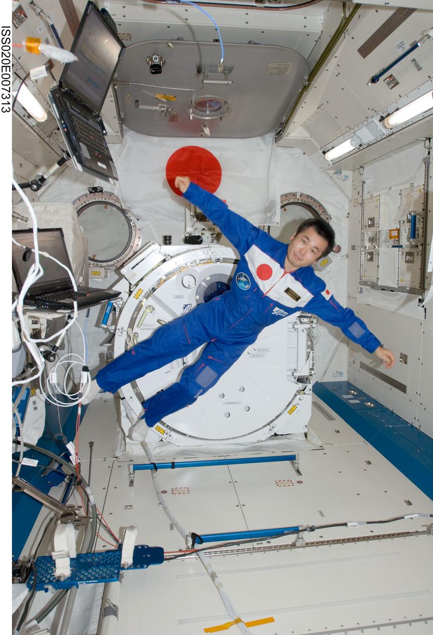 ISS020-E-007313 (3 June 2009) --- Japan Aerospace Exploration Agency (JAXA) astronaut Koichi Wakata, Expedition 20 flight engineer, poses for a photo while floating freely in the Kibo laboratory of the International Space Station.