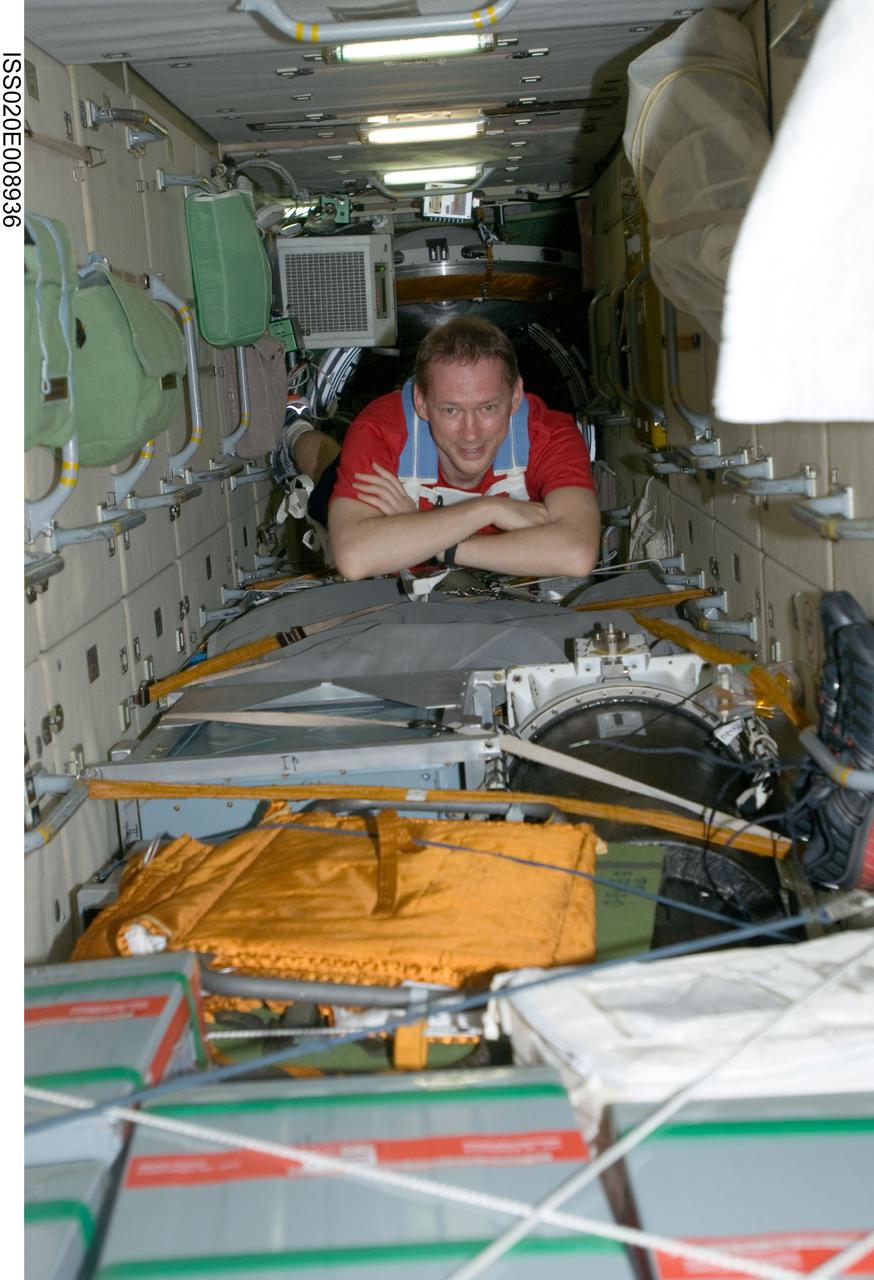 ISS020-E-008936 (14 June 2009) --- European Space Agency astronaut Frank De Winne, Expedition 20 flight engineer, floats through the Zarya functional cargo block (FGB) of the International Space Station.
