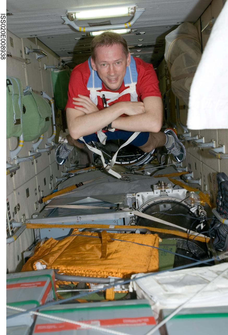 ISS020-E-008938 (14 June 2009) --- European Space Agency astronaut Frank De Winne, Expedition 20 flight engineer, floats through the Zarya functional cargo block (FGB) of the International Space Station.