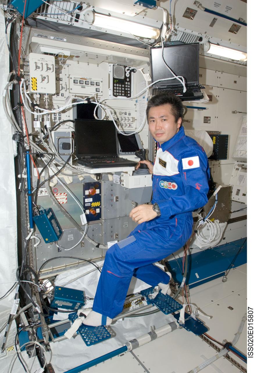 ISS020-E-015807 (28 June 2009) --- Japan Aerospace Exploration Agency (JAXA) astronaut Koichi Wakata, Expedition 20 flight engineer, works at the Japanese Remote Manipulator System (JEM-RMS) work station in the Kibo laboratory of the International Space Station.