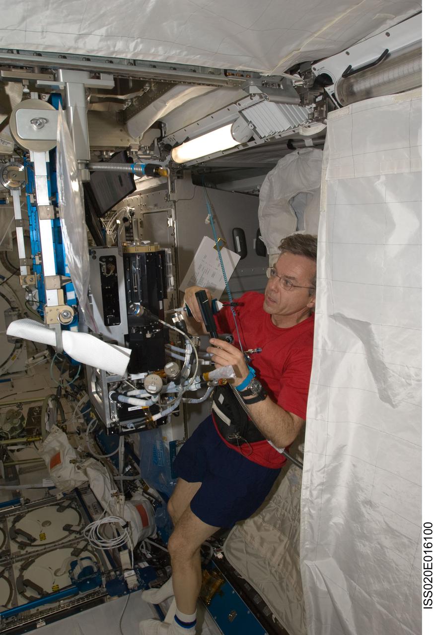 ISS020-E-016100 (1 July 2009) --- Canadian Space Agency astronaut Robert Thirsk, Expedition 20 flight engineer, works with hardware in the Kibo laboratory of the International Space Station.