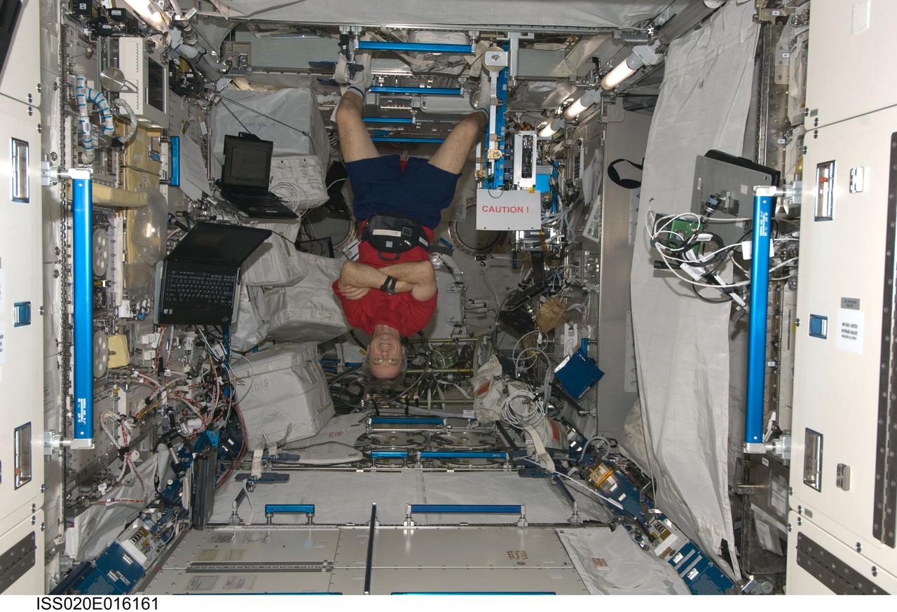 ISS020-E-016161 (30 June 2009) --- Canadian Space Agency astronaut Robert Thirsk, Expedition 20 flight engineer, poses for a photo in the Kibo laboratory of the International Space Station.