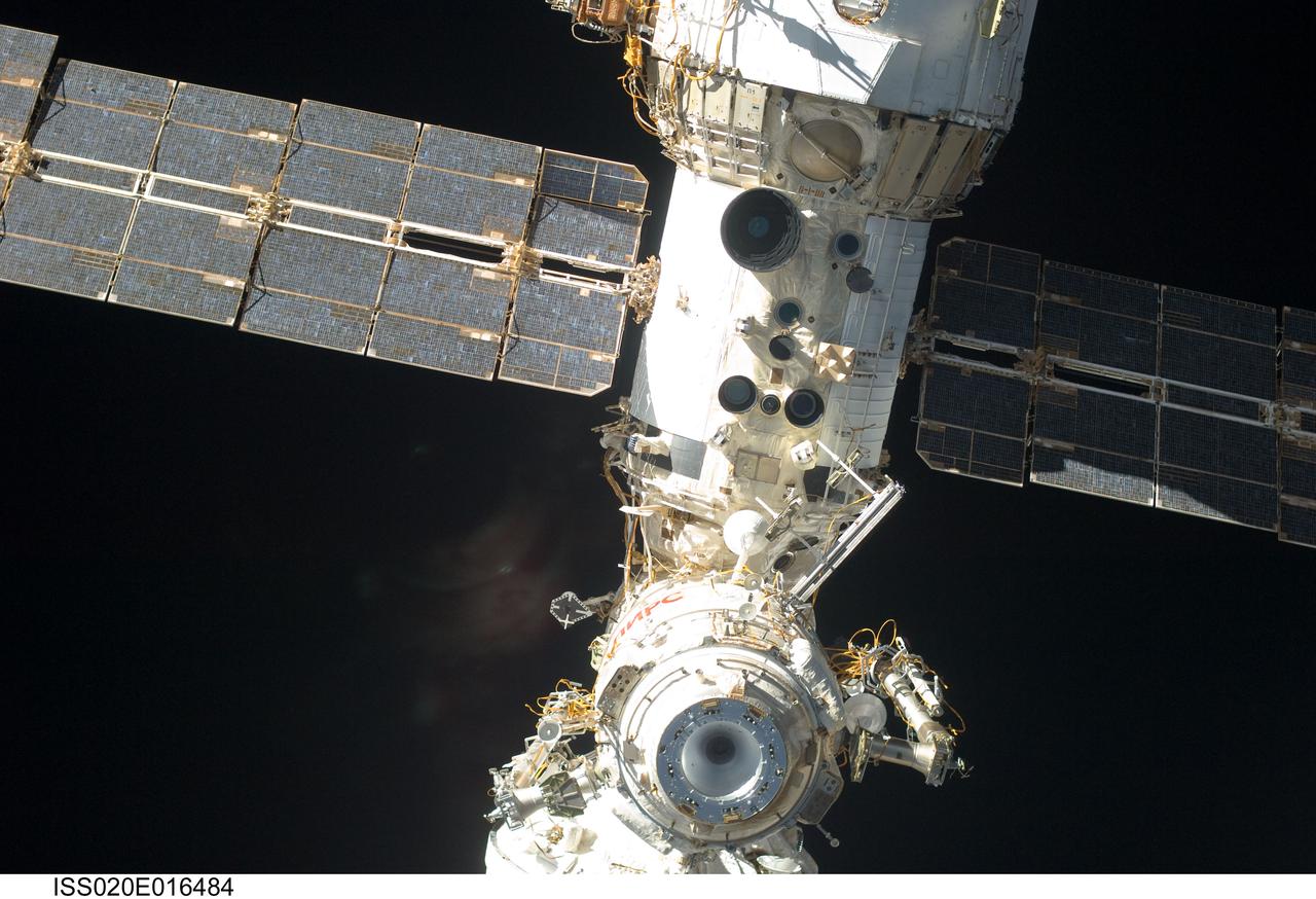 ISS020-E-016484 (2 July 2009) --- A portion of the International Space Station is featured in this image photographed by an Expedition 20 crew member aboard the Soyuz TMA-14 spacecraft during the relocation of the Soyuz from the Zvezda Service Module?s aft port to the Pirs Docking Compartment. Cosmonaut Gennady Padalka, commander; along with NASA astronaut Michael Barratt and Japan Aerospace Exploration Agency (JAXA) astronaut Koichi Wakata, both flight engineers, undocked the Soyuz spacecraft at 4:26 p.m. (CDT) and docked to the Pirs Docking Compartment at 4:54 p.m. on July 2, 2009.