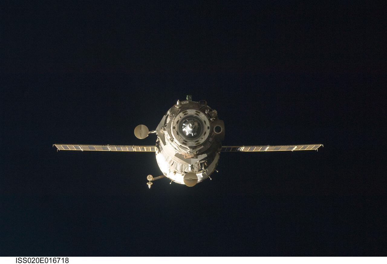 ISS020-E-016718 (2 July 2009) --- The Soyuz TMA-14 spacecraft is featured in this image photographed by an Expedition 20 crew member on the International Space Station during the relocation of the Soyuz from the Zvezda Service Module?s aft port to the Pirs Docking Compartment. Cosmonaut Gennady Padalka, commander; along with NASA astronaut Michael Barratt and Japan Aerospace Exploration Agency (JAXA) astronaut Koichi Wakata, both flight engineers, undocked the Soyuz spacecraft at 4:26 p.m. (CDT) and docked to the Pirs Docking Compartment at 4:54 p.m. on July 2, 2009.