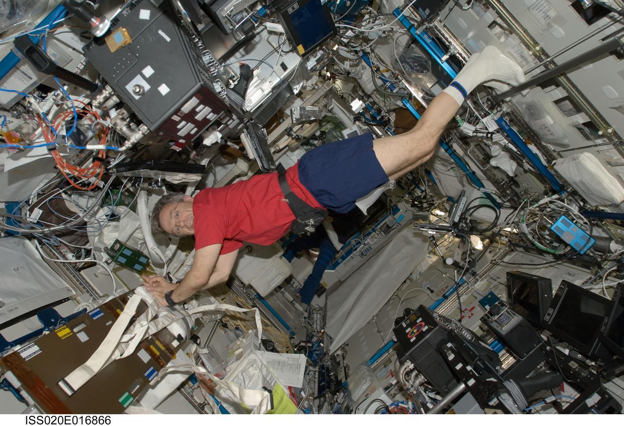 ISS020-E-016866 (2 July 2009) --- Canadian Space Agency astronaut Robert Thirsk, Expedition 20 flight engineer, participates in Crew Health Care Systems (CHeCS) medical emergency training in the Destiny laboratory of the International Space Station.