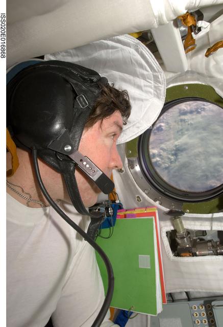 NASA image: Barratt during Soyuz TMA-14 relocation