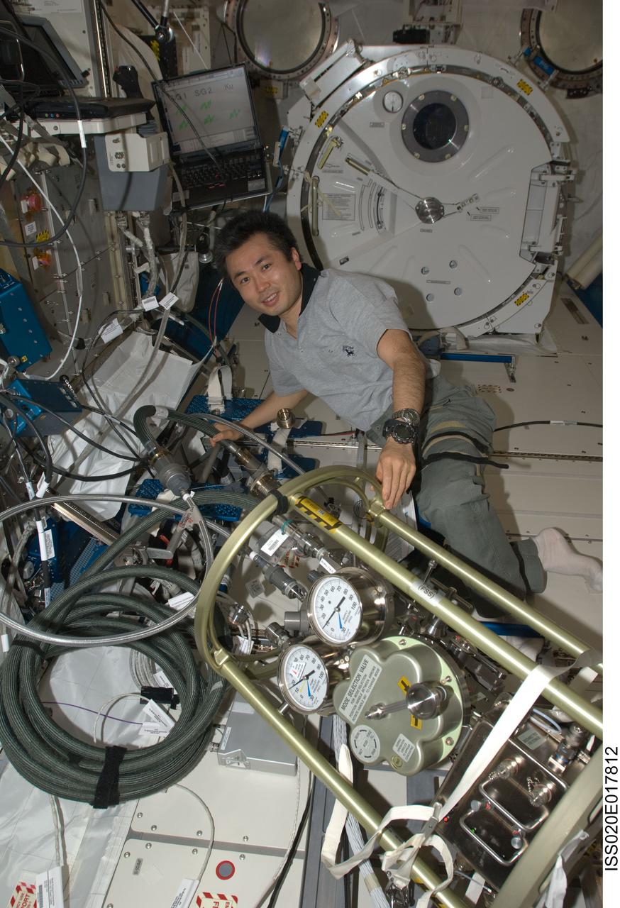 ISS020-E-017812 (7 July 2009) --- Japan Aerospace Exploration Agency (JAXA) astronaut Koichi Wakata, Expedition 20 flight engineer, works with the Fluid Control Pump Assembly (FCPA) in the Kibo laboratory on the International Space Station.
