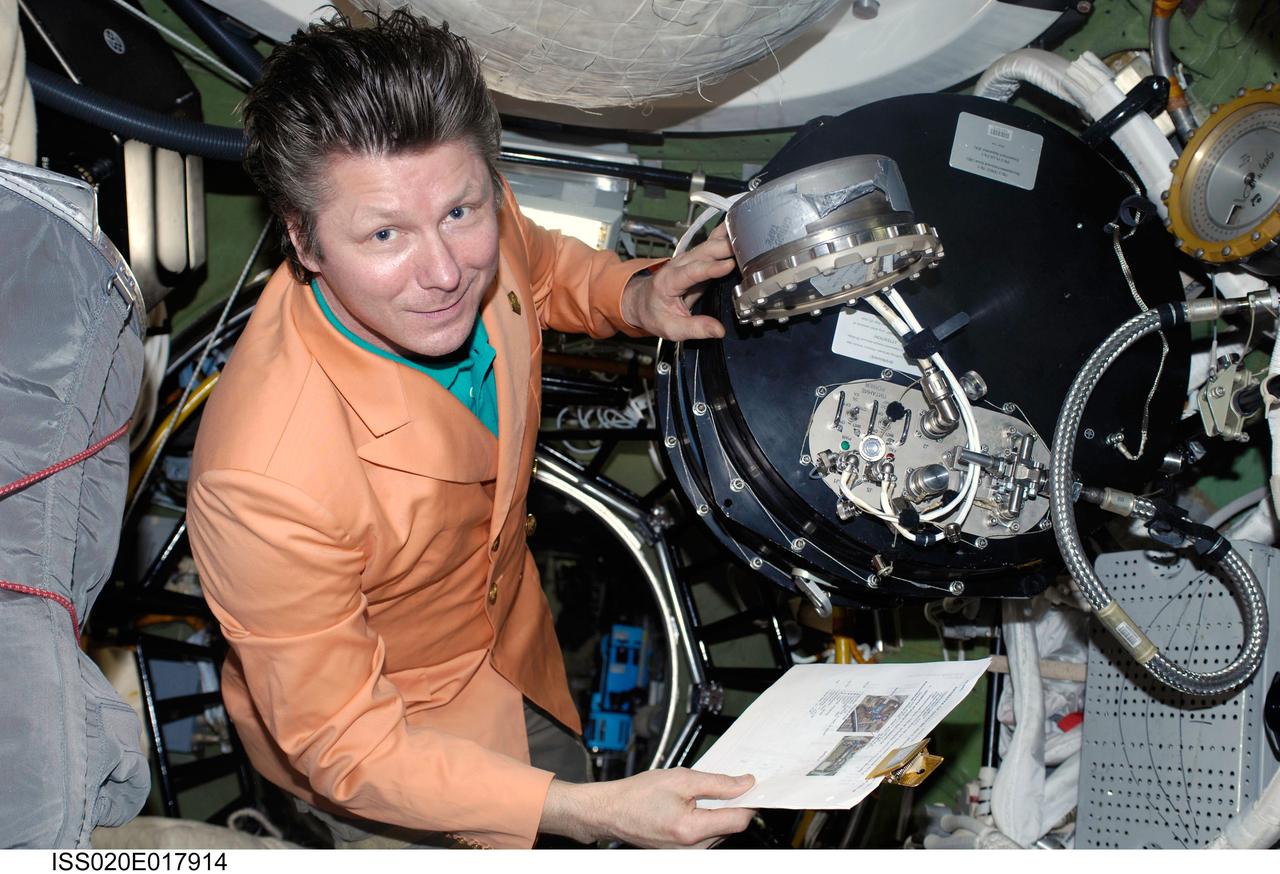 ISS020-E-017914 (8 July 2009) --- Cosmonaut Gennady Padalka, Expedition 20 commander, is pictured in the Pirs Docking Compartment of the International Space Station.