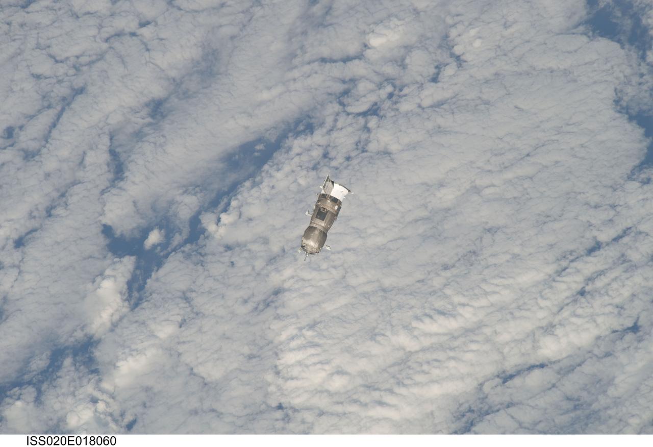 ISS020-E-018060 (12 July 2009) --- An unpiloted ISS Progress 33 cargo craft approaches the International Space Station. On June 30, the Progress undocked from the station and was commanded into a parking orbit for its re-rendezvous with the ISS on July 12, approaching to within 10-15 meters of the Zvezda Service Module to test new automated rendezvous equipment mounted on Zvezda during a pair of spacewalks earlier this month by Gennady Padalka and Mike Barratt that will be used to guide the new Mini-Research Module-2 (MRM2) to an unpiloted docking to the zenith port of Zvezda later this year. MRM2 will serve as a new docking port for Russian spacecraft and an additional airlock for spacewalks conducted out of the Russian segment.