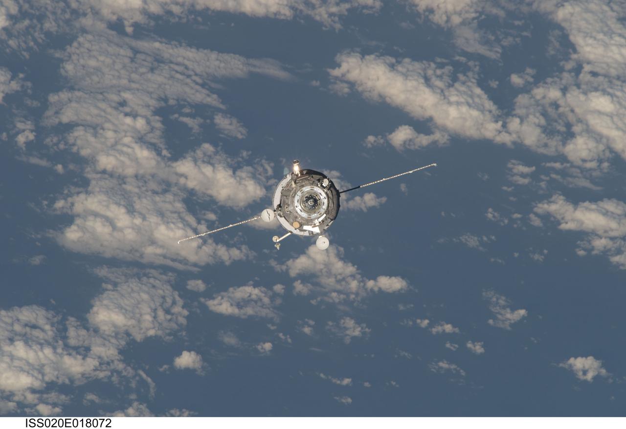 ISS020-E-018072 (12 July 2009) --- An unpiloted ISS Progress 33 cargo craft approaches the International Space Station. On June 30, the Progress undocked from the station and was commanded into a parking orbit for its re-rendezvous with the ISS on July 12, approaching to within 10-15 meters of the Zvezda Service Module to test new automated rendezvous equipment mounted on Zvezda during a pair of spacewalks earlier this month by Gennady Padalka and Mike Barratt that will be used to guide the new Mini-Research Module-2 (MRM2) to an unpiloted docking to the zenith port of Zvezda later this year. MRM2 will serve as a new docking port for Russian spacecraft and an additional airlock for spacewalks conducted out of the Russian segment.