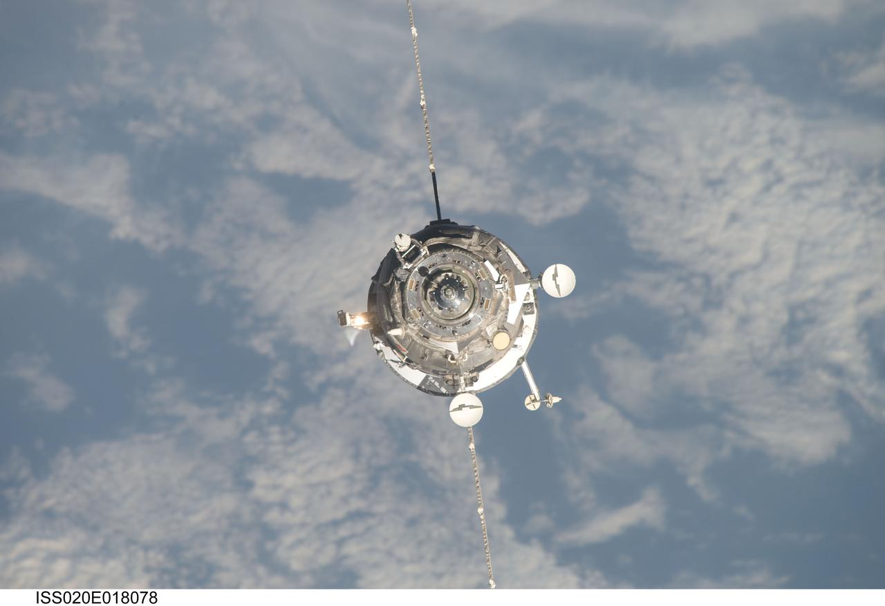 ISS020-E-018078 (12 July 2009) --- An unpiloted ISS Progress 33 cargo craft approaches the International Space Station. On June 30, the Progress undocked from the station and was commanded into a parking orbit for its re-rendezvous with the ISS on July 12, approaching to within 10-15 meters of the Zvezda Service Module to test new automated rendezvous equipment mounted on Zvezda during a pair of spacewalks earlier this month by Gennady Padalka and Mike Barratt that will be used to guide the new Mini-Research Module-2 (MRM2) to an unpiloted docking to the zenith port of Zvezda later this year. MRM2 will serve as a new docking port for Russian spacecraft and an additional airlock for spacewalks conducted out of the Russian segment.