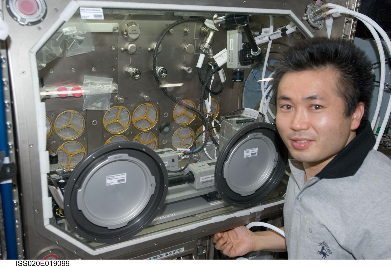 ISS020-E-019099 (13 July 2009) --- Japan Aerospace Exploration Agency (JAXA) astronaut Koichi Wakata, Expedition 20 flight engineer, works with the Investigating the Structure of Paramagnetic Aggregates from Colloidal Emulsions (InSPACE) experiment in the Microgravity Science Glovebox (MSG) in the Columbus laboratory of the International Space Station.