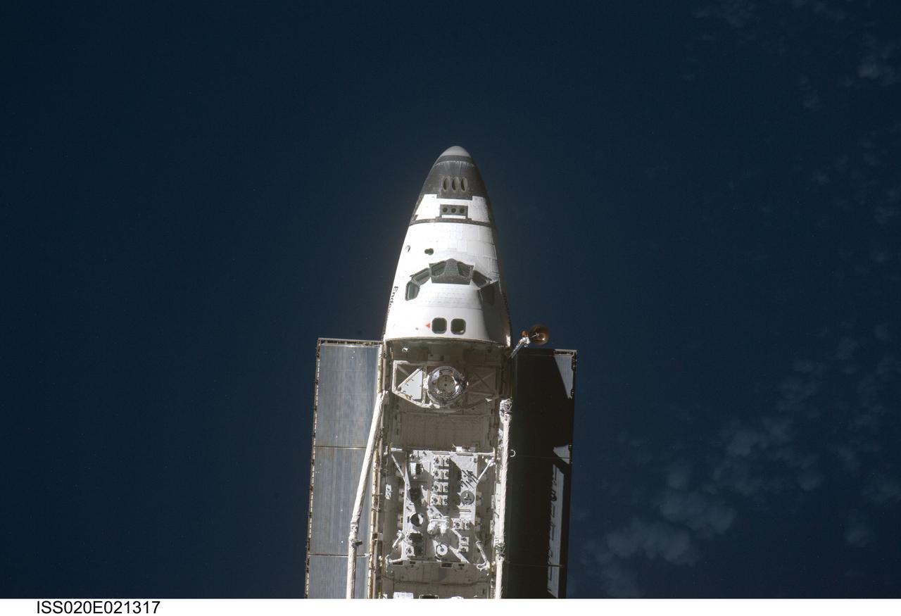 ISS020-E-021317 (17 July 2009) --- This view of the Space Shuttle Endeavour was provided by an Expedition 20 crewmember during a survey of the approaching vehicle prior to docking with the International Space Station. As part of the survey and part of every mission's activities, the STS-127 Endeavour crew performed a back-flip for the rendezvous pitch maneuver (RPM).