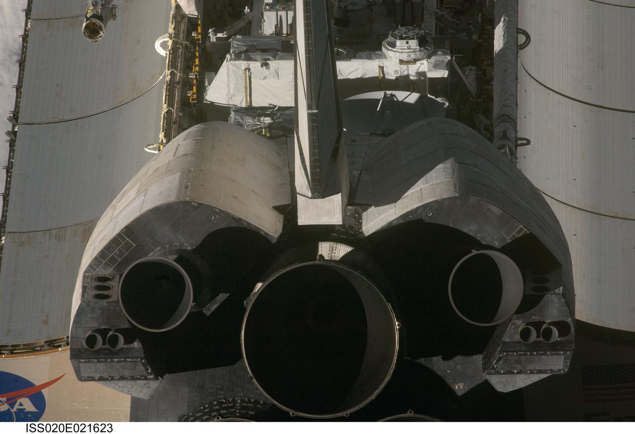 ISS020-E-021623 (17 July 2009) --- This view of the aft portion of the Space Shuttle Endeavour, including the three main engines and part of the cargo bay, was provided by an Expedition 20 crewmember during a survey of the approaching vehicle prior to docking with the International Space Station. As part of the survey and part of every mission's activities, the STS-127 Endeavour crew performed a back-flip for the rendezvous pitch maneuver (RPM). The image was photographed with a digital still camera, using a 400mm lens at a distance of about 600 feet (180 meters).