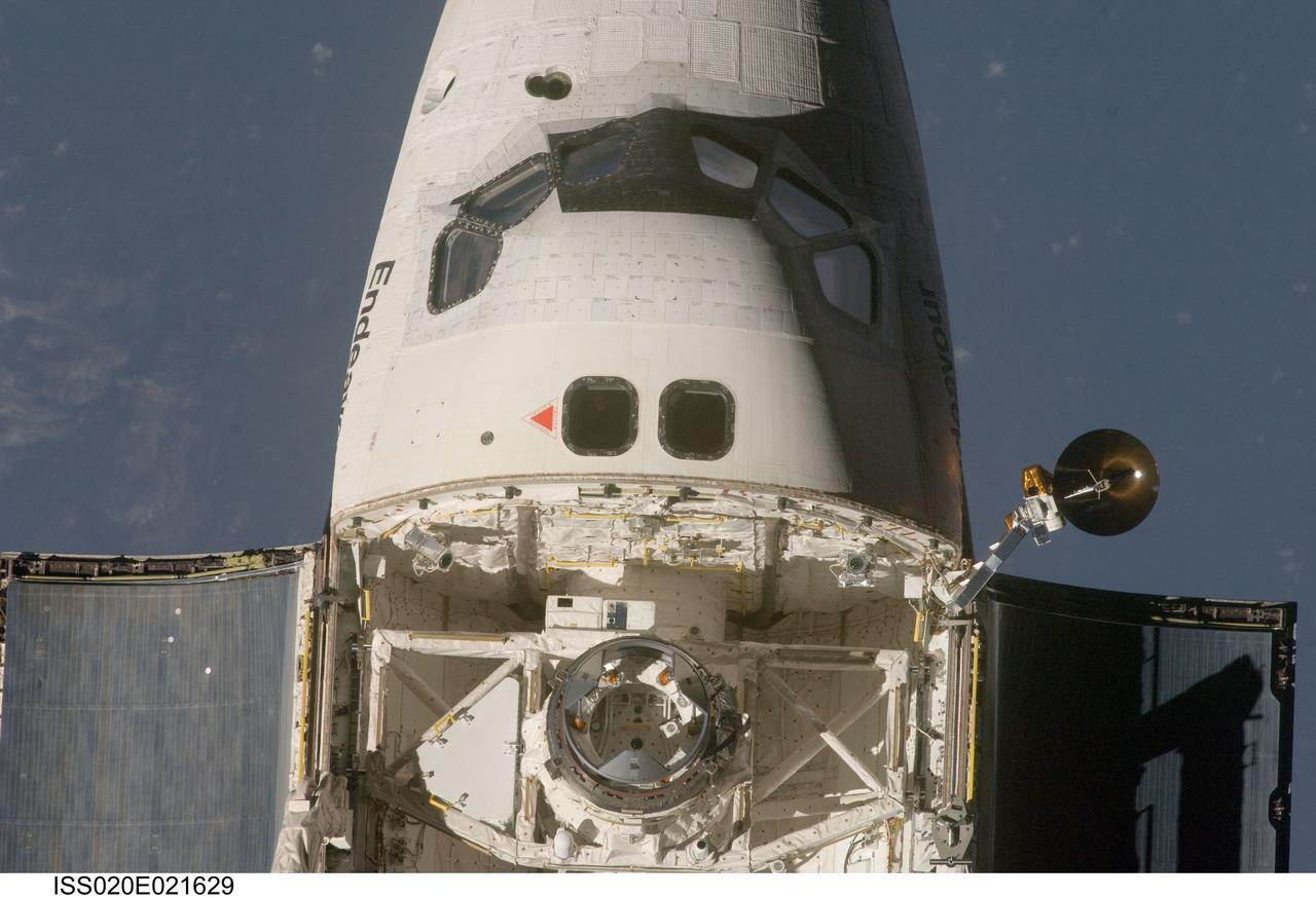 ISS020-E-021629 (17 July 2009) --- This view of the crew cabin and part of the cargo bay of the Space Shuttle Endeavour was provided by an Expedition 20 crewmember during a survey of the approaching vehicle prior to docking with to the International Space Station. As part of the survey and part of every mission's activities, the STS-127 Endeavour crew performed a back-flip for the rendezvous pitch maneuver (RPM). The image was photographed with a digital still camera, using a 400mm lens at a distance of about 600 feet (180 meters).