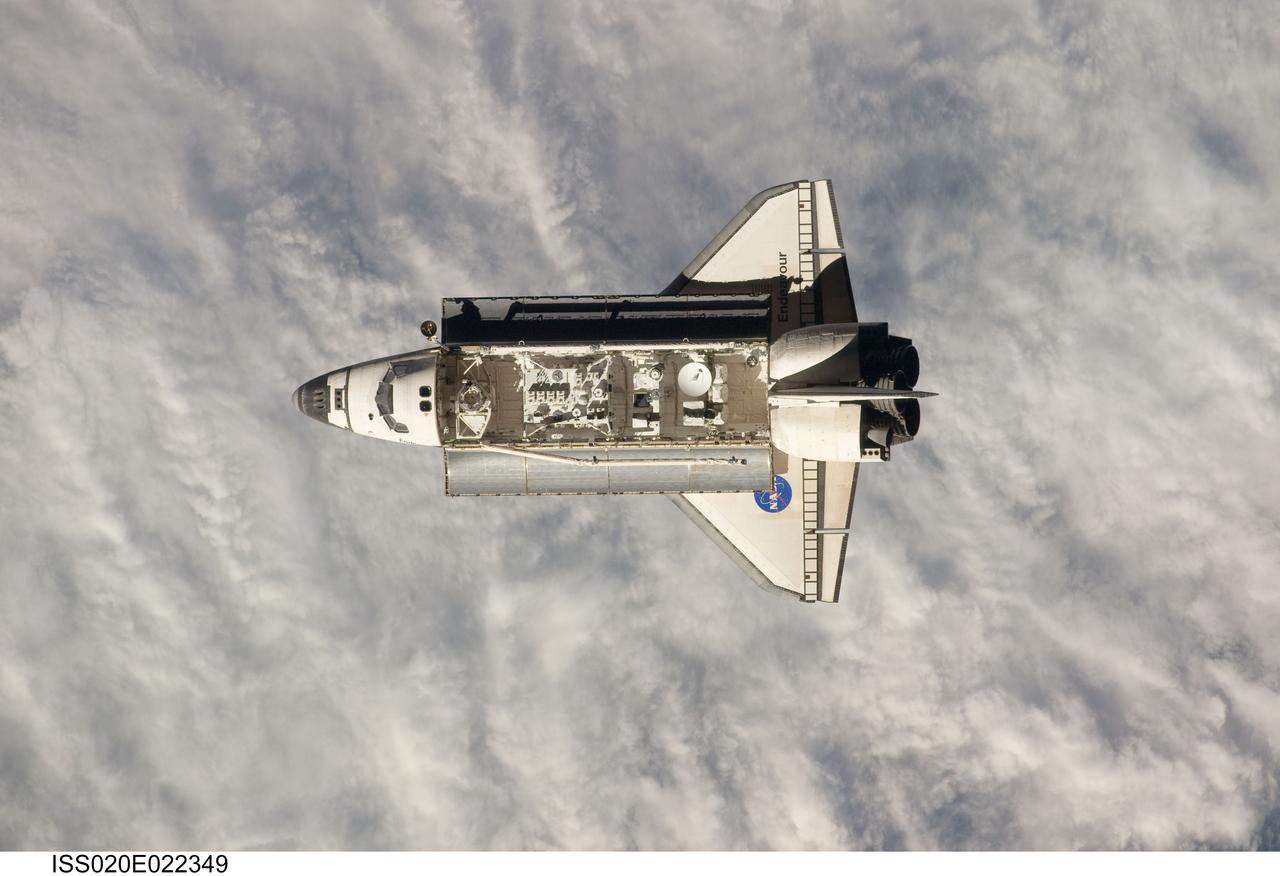 ISS020-E-022349 (17 July 2009) --- This view of the Space Shuttle Endeavour was one of a series provided by an Expedition 20 crewmember prior to and during a survey of the approaching vehicle before docking with the International Space Station. As part of the survey and part of every mission's activities, the STS-127 Endeavour crew performed a back-flip for the rendezvous pitch maneuver (RPM).