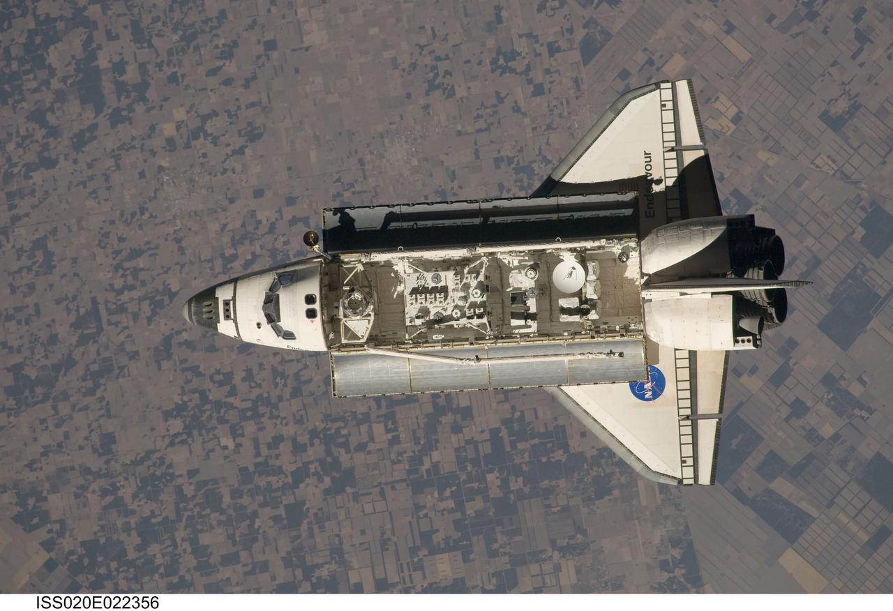 ISS020-E-022356 (17 July 2009) --- This view of the Space Shuttle Endeavour was one of a series provided by an Expedition 20 crewmember prior to and during a survey of the approaching vehicle before docking with the International Space Station. As part of the survey and part of every mission's activities, the STS-127 Endeavour crew performed a back-flip for the rendezvous pitch maneuver (RPM).