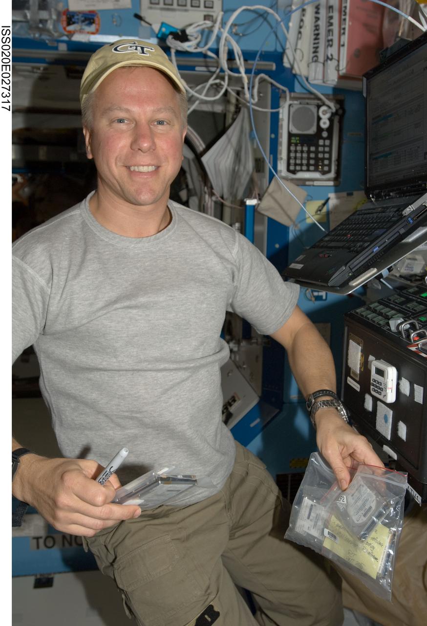 ISS020-E-027317 (4 Aug. 2009) --- Astronaut Tim Kopra, Expedition 20 flight engineer, is pictured in the Destiny laboratory of the International Space Station.
