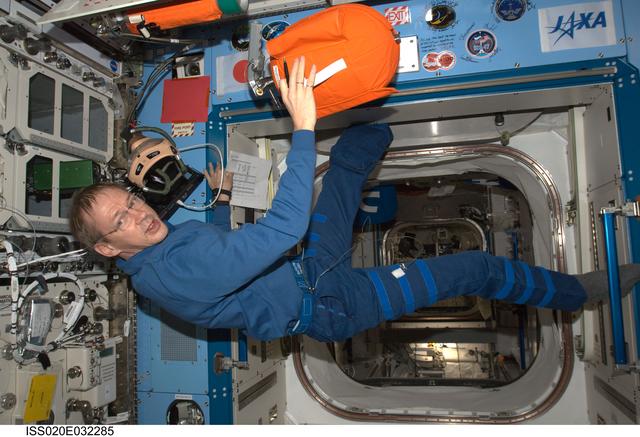 NASA image: De Winne with PFE and PBA equipment in JEM Pressurized Module (JPM)