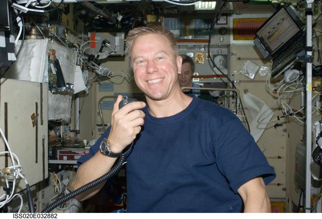 NASA image: Kopra on ham radio in Service module.