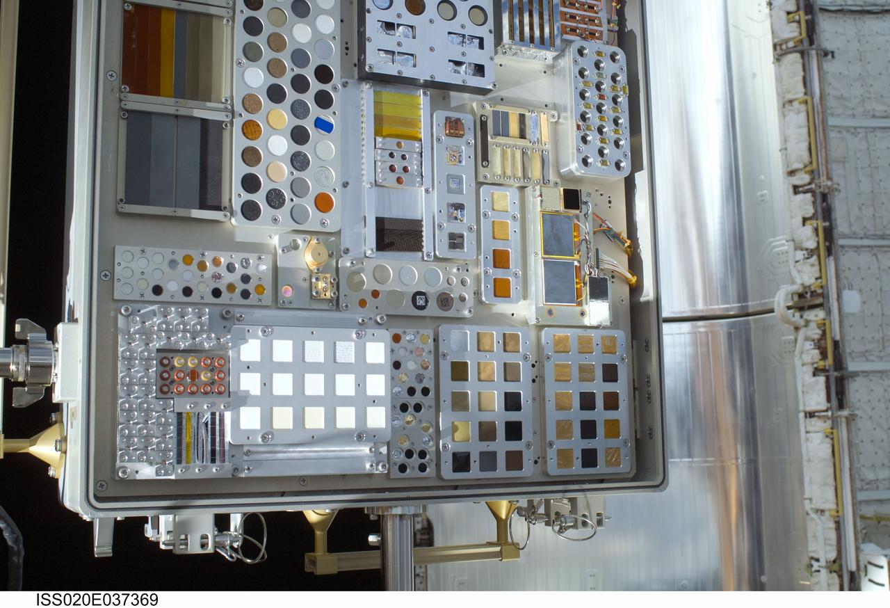 ISS020-E-037369 (1 Sept. 2009) --- A close-up view of a Materials International Space Station Experiment (MISSE-6) on the exterior of the Columbus laboratory is featured in this image photographed by a space walking astronaut during the STS-128 mission’s first session of extravehicular activity (EVA). MISSE collects information on how different materials weather in the environment of space. MISSE was later placed in Space Shuttle Discovery’s payload bay for its return to Earth. A portion of a payload bay door is visible in the background.