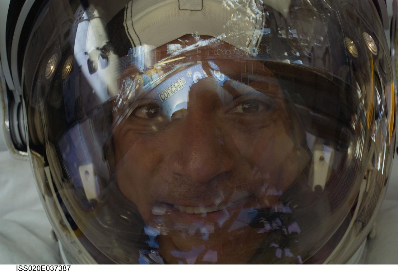 ISS020-E-037387 (1 Sept. 2009) --- This is a close-up view of the face of astronaut John ?Danny? Olivas, STS-128 mission specialist,  as he participated in the STS-128 mission's first session of extravehicular activity (EVA) as construction and maintenance picked up once more on the International Space Station. During the six-hour, 35-minute spacewalk, Olivas and astronaut Nicole Stott (out of frame),   Expedition 20 flight engineer, removed an empty ammonia tank from the station's truss and temporarily stowed it on the station's robotic arm. Olivas and Stott also retrieved the European Technology Exposure Facility (EuTEF) and Materials International Space Station Experiment (MISSE) from the Columbus laboratory module and installed them on Discovery's payload bay for return.