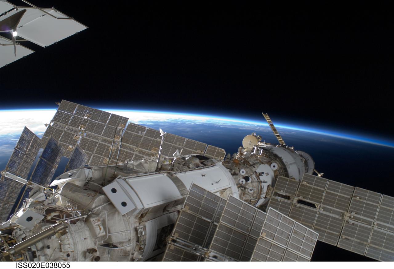 ISS020-E-038055 (3 Sept. 2009) --- A portion of the International Space Station is featured in this image photographed by a space walking astronaut during the STS-128 mission?s second session of extravehicular activity (EVA) as construction and maintenance continue on the station. The blackness of space and Earth?s horizon provide the backdrop for the scene.