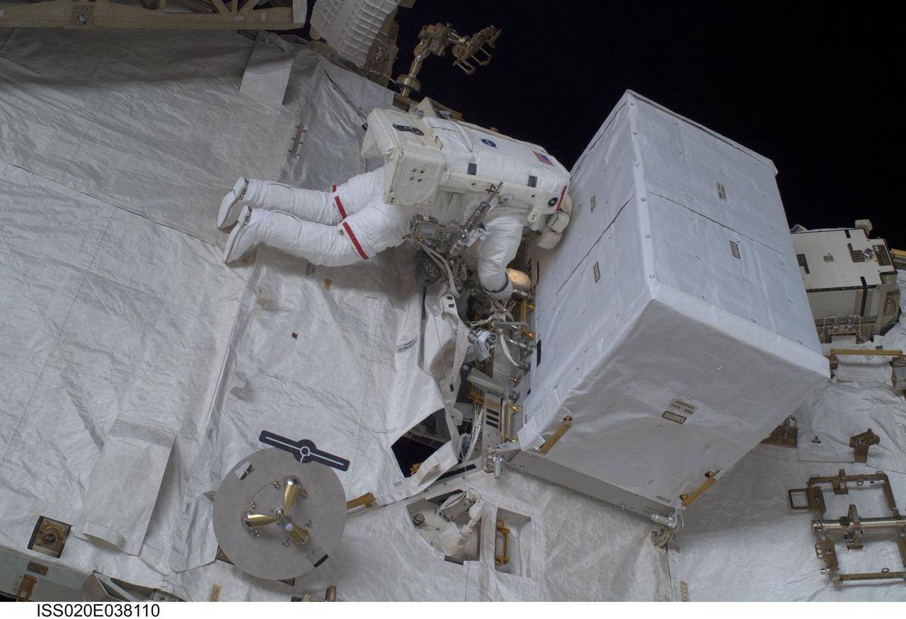 ISS020-E-038110 (3 Sept. 2009) --- NASA astronaut John ?Danny? Olivas, STS-128 mission specialist, participates in the mission's second session of extravehicular activity (EVA) as construction and maintenance continue on the International Space Station. During the six-hour, 39-minute spacewalk, Olivas and European Space Agency astronaut Christer Fuglesang (out of frame), mission specialist, installed the new Ammonia Tank Assembly on the Port 1 Truss and stowed the empty tank assembly into the Space Shuttle Discovery?s cargo bay.