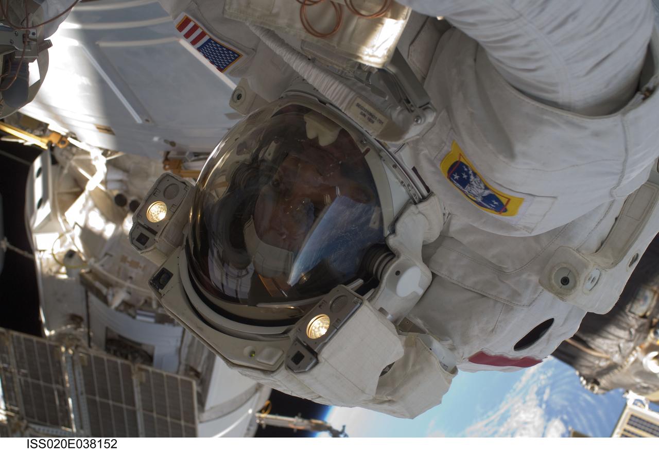 ISS020-E-038152 (3 Sept. 2009) --- NASA astronaut John ?Danny? Olivas, STS-128 mission specialist, participates in the mission's second session of extravehicular activity (EVA) as construction and maintenance continue on the International Space Station. During the six-hour, 39-minute spacewalk, Olivas and European Space Agency astronaut Christer Fuglesang (out of frame), mission specialist, installed the new Ammonia Tank Assembly on the Port 1 Truss and stowed the empty tank assembly into the Space Shuttle Discovery?s cargo bay.