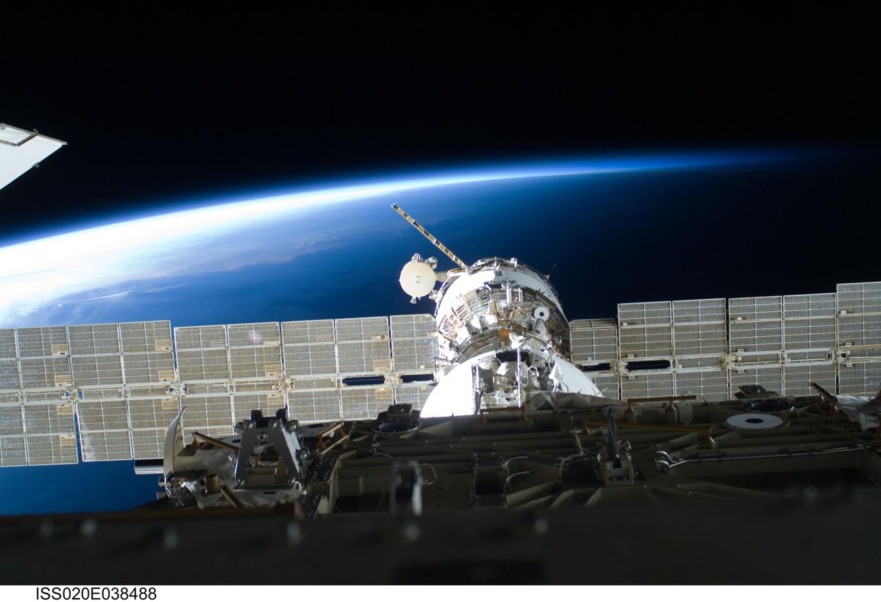 ISS020-E-038488 (5 Sept. 2009) --- A portion of the International Space Station is featured in this image photographed by a space walking astronaut during the STS-128 mission?s third and final session of extravehicular activity (EVA) as construction and maintenance continue on the station. The blackness of space and Earth?s horizon provide the backdrop for the scene.