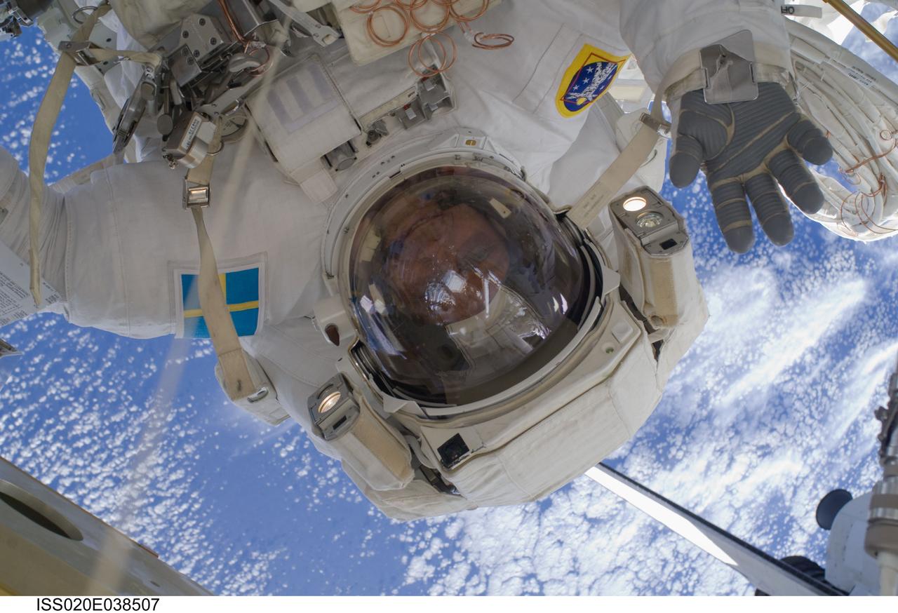 ISS020-E-038507 (5 Sept. 2009) --- European Space Agency astronaut Christer Fuglesang, STS-128 mission specialist, participates in the mission's third and final session of extravehicular activity (EVA) as construction and maintenance continue on the International Space Station. During the seven-hour, one-minute spacewalk, Fuglesang and NASA astronaut John ?Danny? Olivas (out of frame), mission specialist, deployed the Payload Attachment System (PAS), replaced the Rate Gyro Assembly #2, installed two GPS antennae and did some work to prepare for the installation of Node 3 next year. During connection of one of two sets of avionics cables for Node 3, one of the connectors could not be mated. This cable and connector were wrapped in a protective sleeve and safed. All other cables were mated successfully.