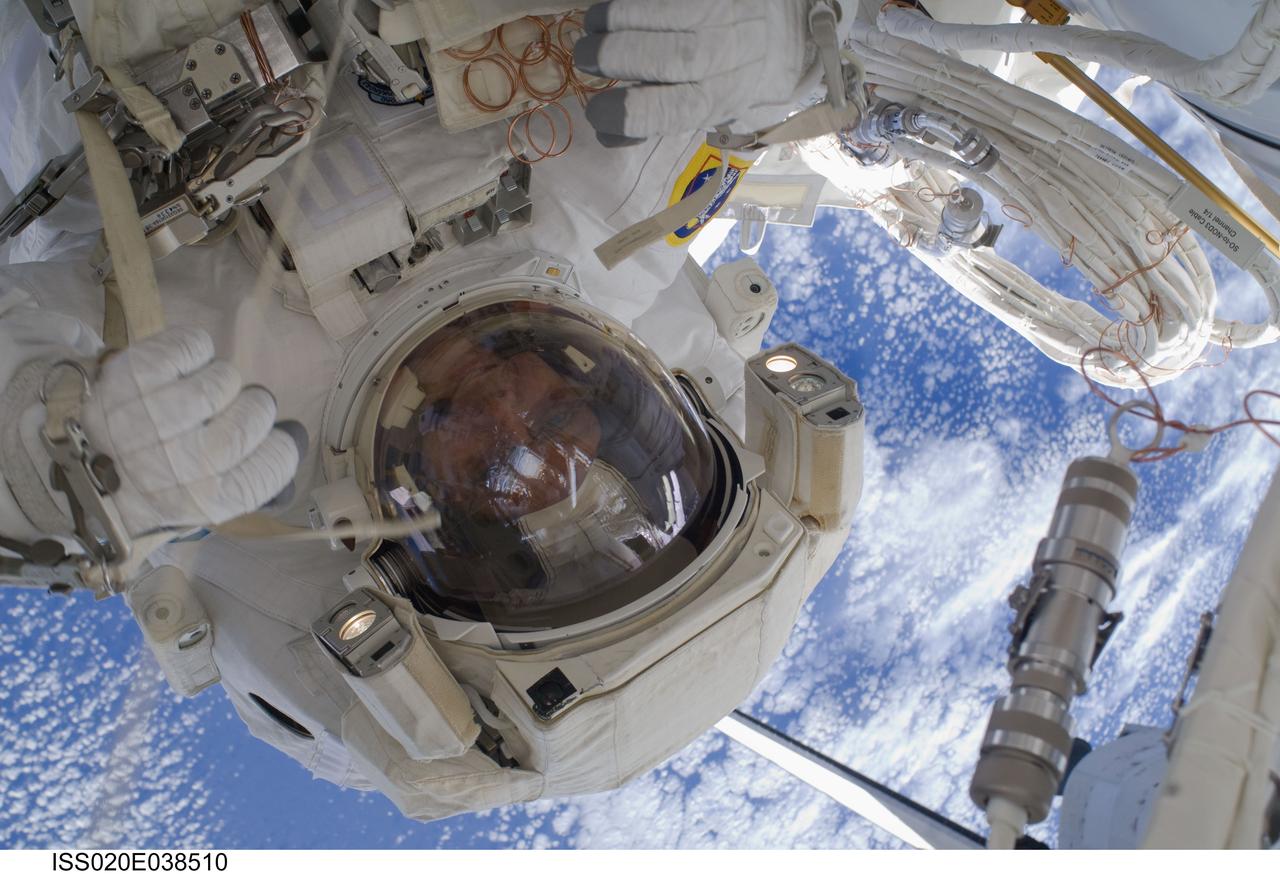 ISS020-E-038510 (5 Sept. 2009) --- European Space Agency astronaut Christer Fuglesang, STS-128 mission specialist, participates in the mission's third and final session of extravehicular activity (EVA) as construction and maintenance continue on the International Space Station. During the seven-hour, one-minute spacewalk, Fuglesang and NASA astronaut John ?Danny? Olivas (out of frame), mission specialist, deployed the Payload Attachment System (PAS), replaced the Rate Gyro Assembly #2, installed two GPS antennae and did some work to prepare for the installation of Node 3 next year. During connection of one of two sets of avionics cables for Node 3, one of the connectors could not be mated. This cable and connector were wrapped in a protective sleeve and safed. All other cables were mated successfully.