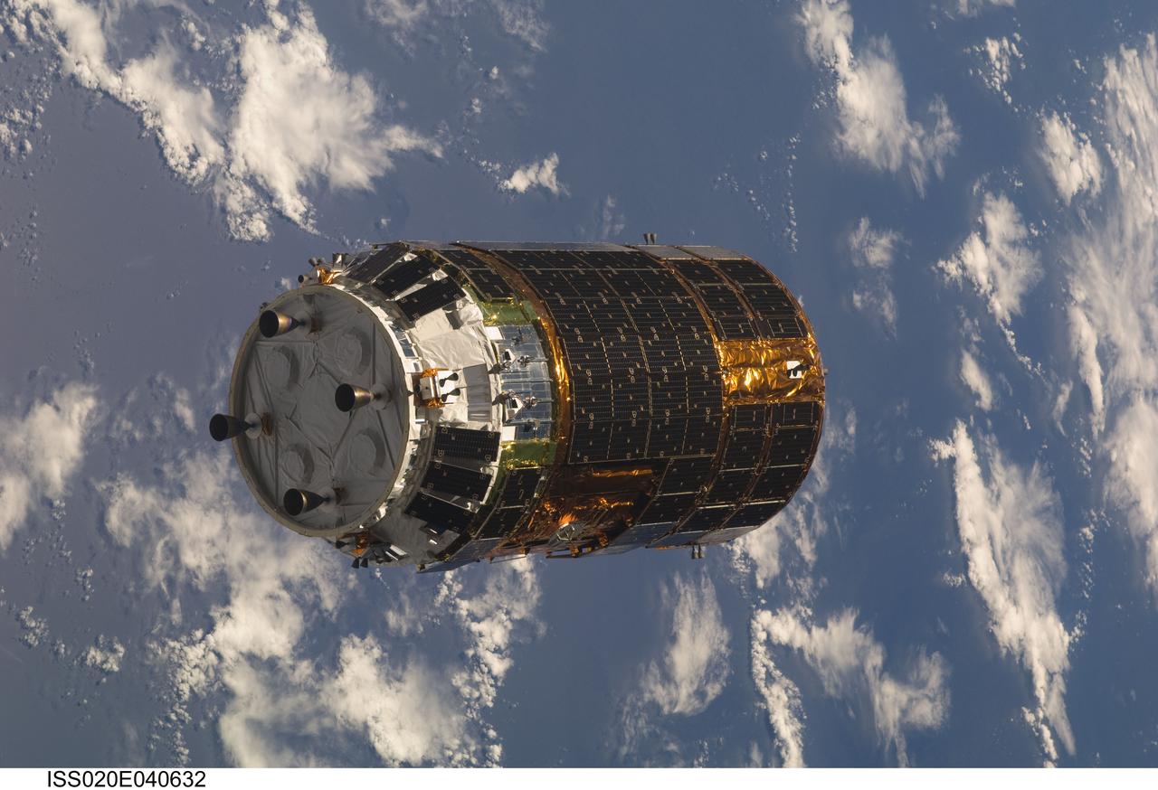 ISS020-E-040632 (17 Sept. 2009) --- Backdropped by a blue and white part of Earth, the unpiloted Japanese H-II Transfer Vehicle (HTV) approaches the International Space Station. Once the HTV was in range, NASA astronaut Nicole Stott, Canadian Space Agency astronaut Robert Thirsk and European Space Agency astronaut Frank De Winne, all Expedition 20 flight engineers, used the station’s robotic arm to grab the cargo craft and attach it to the Earth-facing port of the Harmony node. The attachment was completed at 5:26 (CDT) on Sept. 17, 2009.