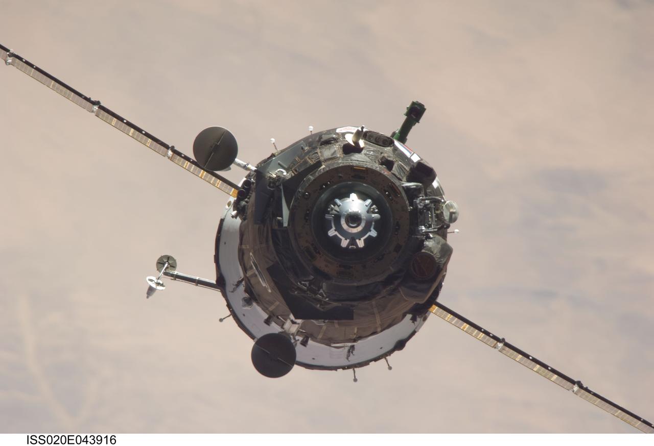 ISS020-E-043916 (2 Oct. 2009) --- The Soyuz TMA-16 spacecraft approaches the International Space Station, carrying NASA astronaut Jeffrey Williams, Expedition 21 flight engineer; Russian cosmonaut Maxim Suraev, Soyuz commander and flight engineer; and spaceflight participant Guy Laliberté. Williams and Suraev will spend six months on the station, while Laliberté will return to Earth on Oct. 10 with two of the Expedition 20 crew members currently on the complex. Docking to the Zvezda Service Module aft port occurred at 3:35 a.m. (CDT) on Oct. 2, 2009.