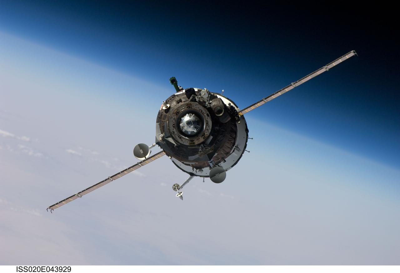 ISS020-E-043929 (2 Oct. 2009) --- The Soyuz TMA-16 spacecraft approaches the International Space Station, carrying NASA astronaut Jeffrey Williams, Expedition 21 flight engineer; Russian cosmonaut Maxim Suraev, Soyuz commander and flight engineer; and spaceflight participant Guy Laliberté. Williams and Suraev will spend six months on the station, while Laliberté will return to Earth on Oct. 10 with two of the Expedition 20 crew members currently on the complex. Docking to the Zvezda Service Module aft port occurred at 3:35 a.m. (CDT) on Oct. 2, 2009.