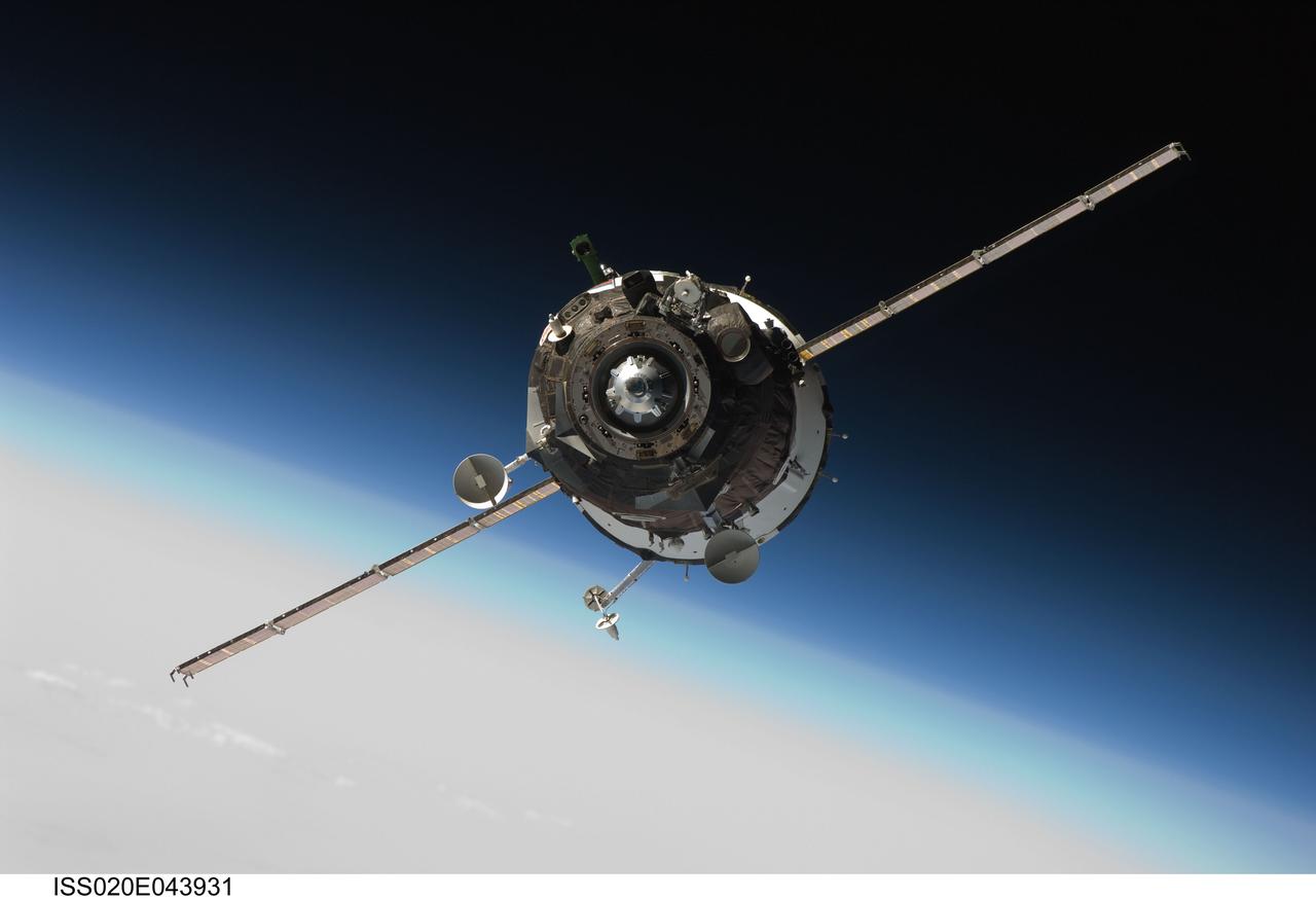 ISS020-E-043931 (2 Oct. 2009) --- The Soyuz TMA-16 spacecraft approaches the International Space Station, carrying NASA astronaut Jeffrey Williams, Expedition 21 flight engineer; Russian cosmonaut Maxim Suraev, Soyuz commander and flight engineer; and spaceflight participant Guy Laliberte. Williams and Suraev will spend six months on the station, while Laliberte will return to Earth on Oct. 10 with two of the Expedition 20 crew members currently on the complex. Docking to the Zvezda Service Module aft port occurred at 3:35 a.m. (CDT) on Oct. 2, 2009.