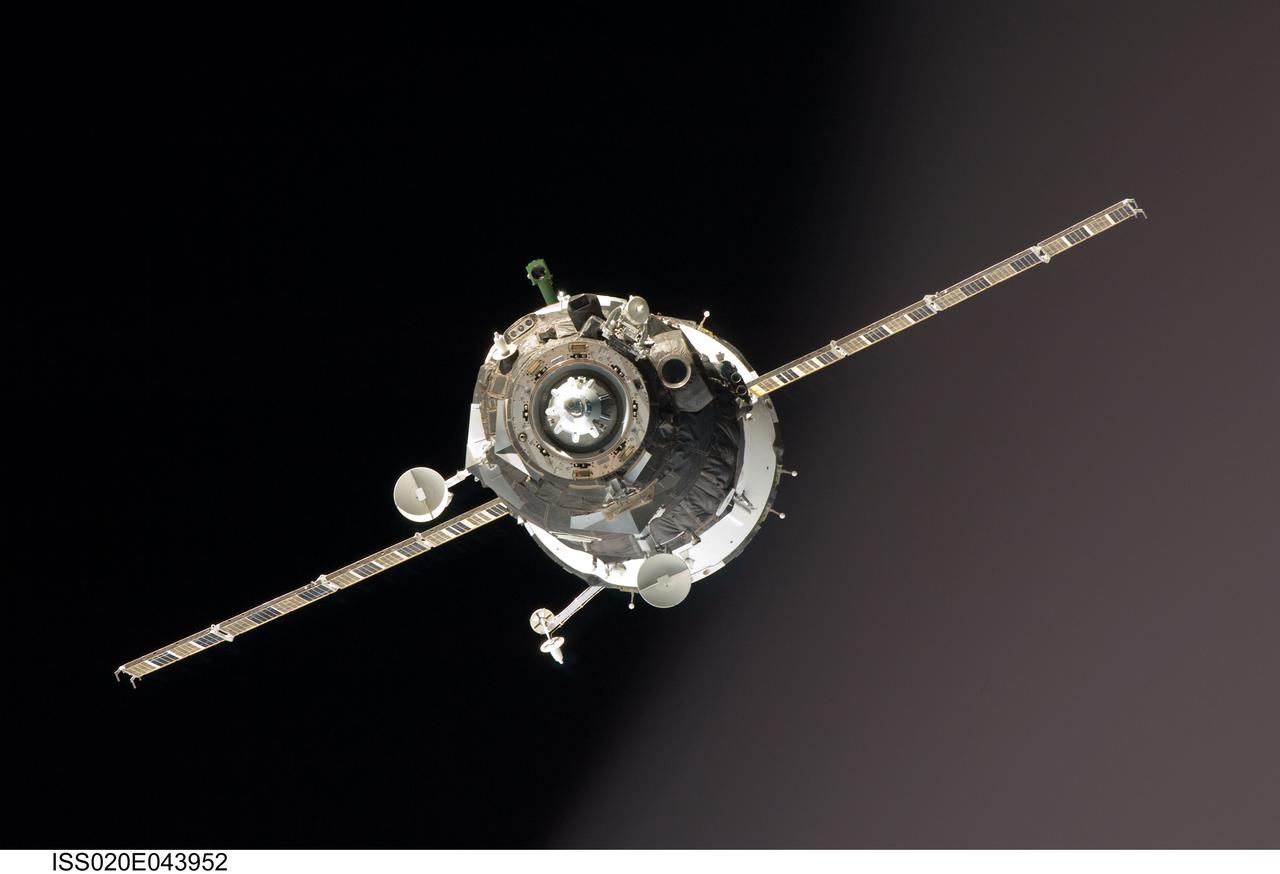 ISS020-E-043952 (2 Oct. 2009) --- The Soyuz TMA-16 spacecraft approaches the International Space Station, carrying NASA astronaut Jeffrey Williams, Expedition 21 flight engineer; Russian cosmonaut Maxim Suraev, Soyuz commander and flight engineer; and spaceflight participant Guy Laliberté. Williams and Suraev will spend six months on the station, while Laliberté will return to Earth on Oct. 10 with two of the Expedition 20 crew members currently on the complex. Docking to the Zvezda Service Module aft port occurred at 3:35 a.m. (CDT) on Oct. 2, 2009.