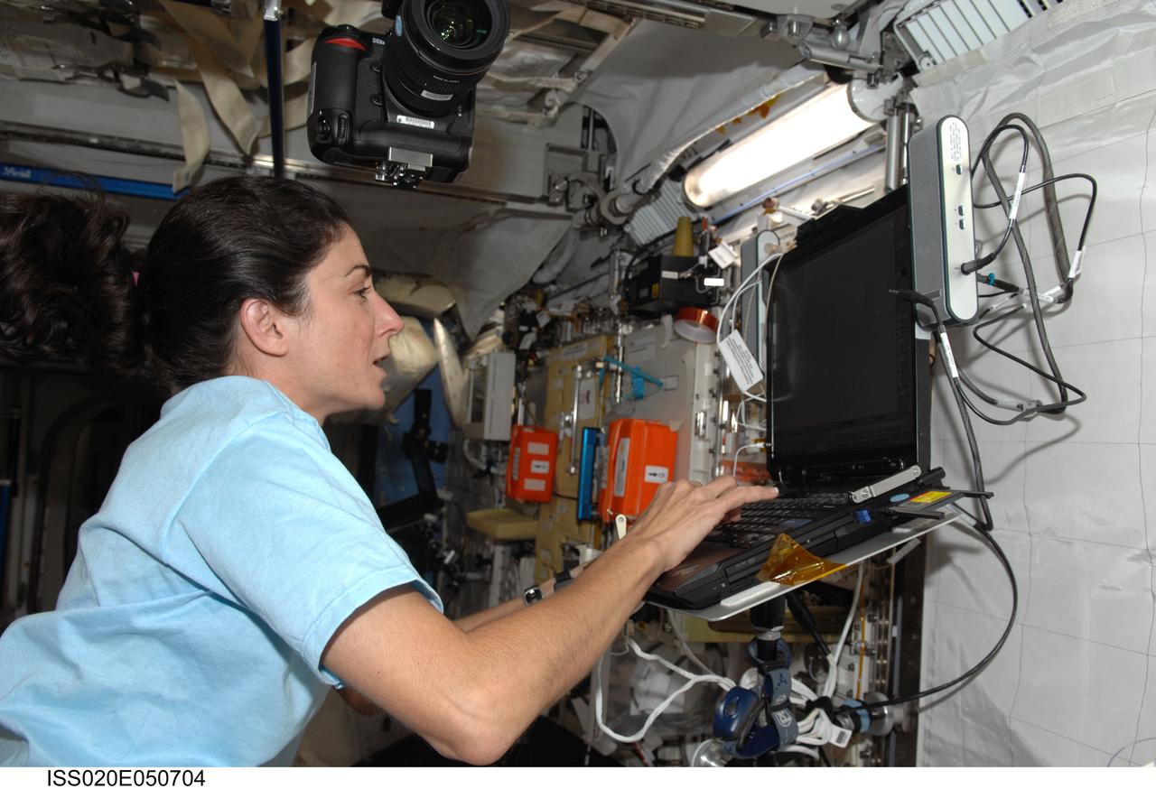 ISS020-E-050704 (10 Oct. 2009) --- NASA astronaut Nicole Stott, Expedition 20/21 flight engineer, uses a computer in the Kibo laboratory of the International Space Station.