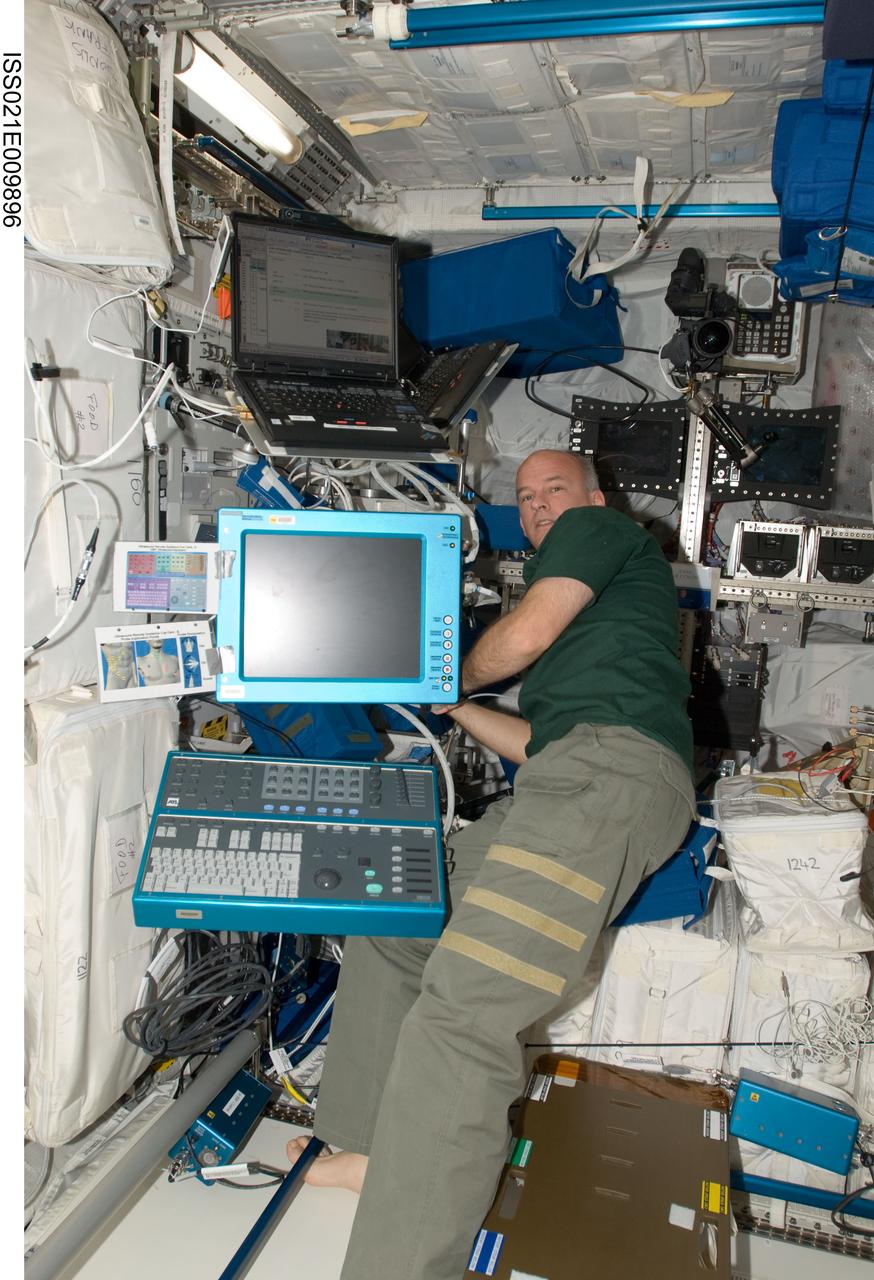ISS021-E-009896 (17 Oct. 2009) --- NASA astronaut Jeffrey Williams, Expedition 21 flight engineer, works in the Columbus laboratory of the International Space Station.