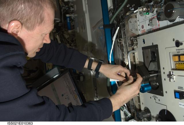 NASA image: CDR De Winne takes Water Samples for analysis in the US Lab