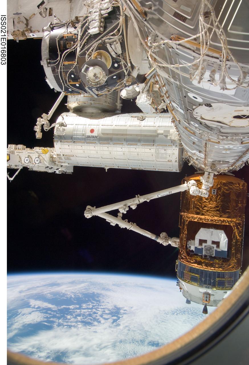 ISS021-E-016803 (30 Oct. 2009) --- Backdropped by Earth’s horizon and the blackness of space, the International Space Station's Canadarm2 grapples the unpiloted Japanese H-II Transfer Vehicle (HTV) in preparation for its release from the station. European Space Agency astronaut Frank De Winne, Expedition 21 commander; NASA astronaut Nicole Stott and Canadian Space Agency astronaut Robert Thirsk, both flight engineers, used the station’s robotic arm to grab the HTV cargo craft, filled with trash and unneeded items, and unberth it from the Harmony node’s nadir port. The HTV was successfully unberthed at 10:18 a.m. (CDT) on Oct. 30, 2009, and released from the station’s Canadarm2 at 12:32 p.m.