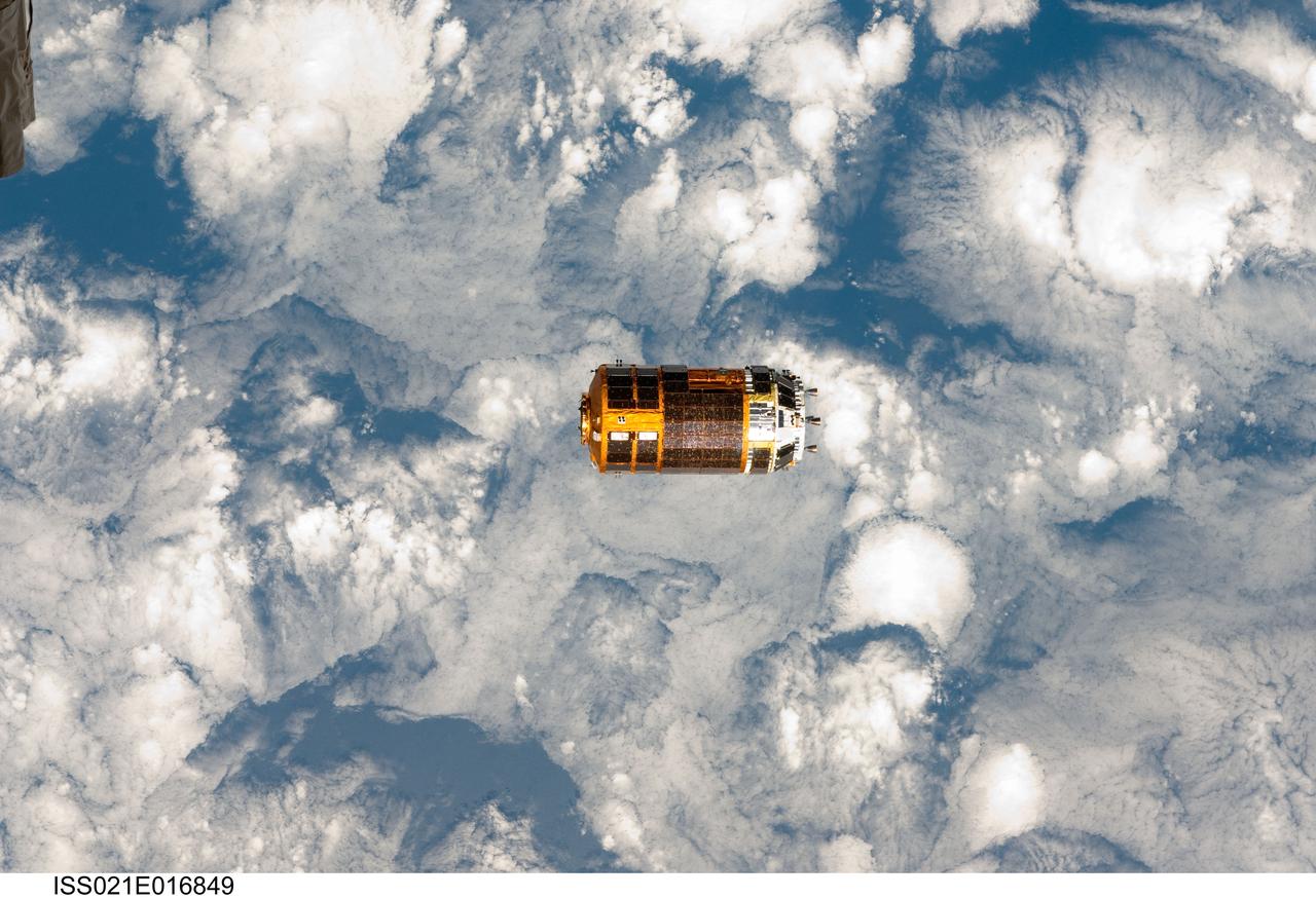 ISS021-E-016849 (30 Oct. 2009) --- Backdropped by a blue and white part of Earth, the unpiloted Japanese H-II Transfer Vehicle (HTV), filled with trash and unneeded items, departs from the International Space Station. European Space Agency astronaut Frank De Winne, Expedition 21 commander; NASA astronaut Nicole Stott and Canadian Space Agency astronaut Robert Thirsk, both flight engineers, used the station’s Canadarm2 robotic arm to grab the HTV cargo craft and unberth it from the Harmony node’s nadir port. The HTV was successfully unberthed at 10:18 a.m. (CDT) on Oct. 30, 2009, and released from the station’s Canadarm2 at 12:32 p.m.