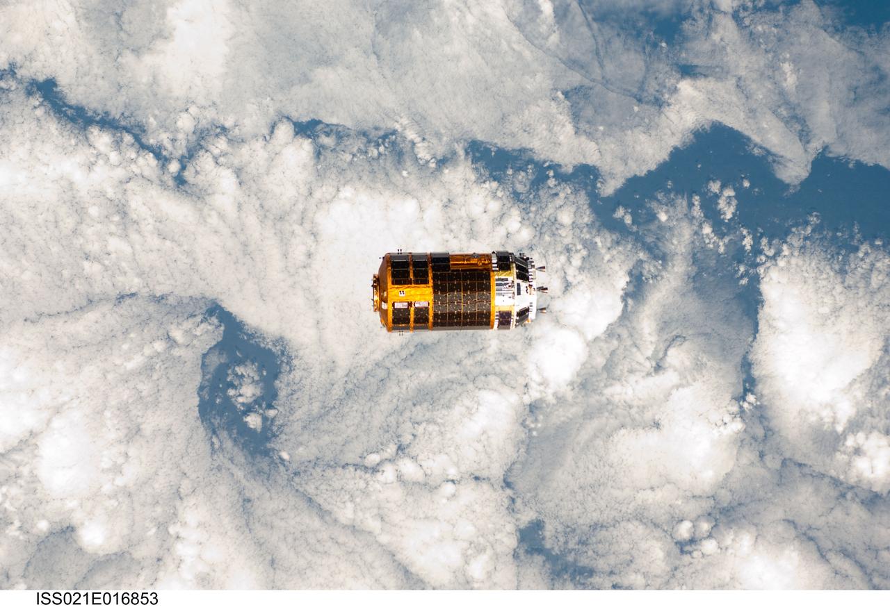 ISS021-E-016853 (30 Oct. 2009) --- Backdropped by a blue and white part of Earth, the unpiloted Japanese H-II Transfer Vehicle (HTV), filled with trash and unneeded items, departs from the International Space Station. European Space Agency astronaut Frank De Winne, Expedition 21 commander; NASA astronaut Nicole Stott and Canadian Space Agency astronaut Robert Thirsk, both flight engineers, used the station’s Canadarm2 robotic arm to grab the HTV cargo craft and unberth it from the Harmony node’s nadir port. The HTV was successfully unberthed at 10:18 a.m. (CDT) on Oct. 30, 2009, and released from the station’s Canadarm2 at 12:32 p.m.