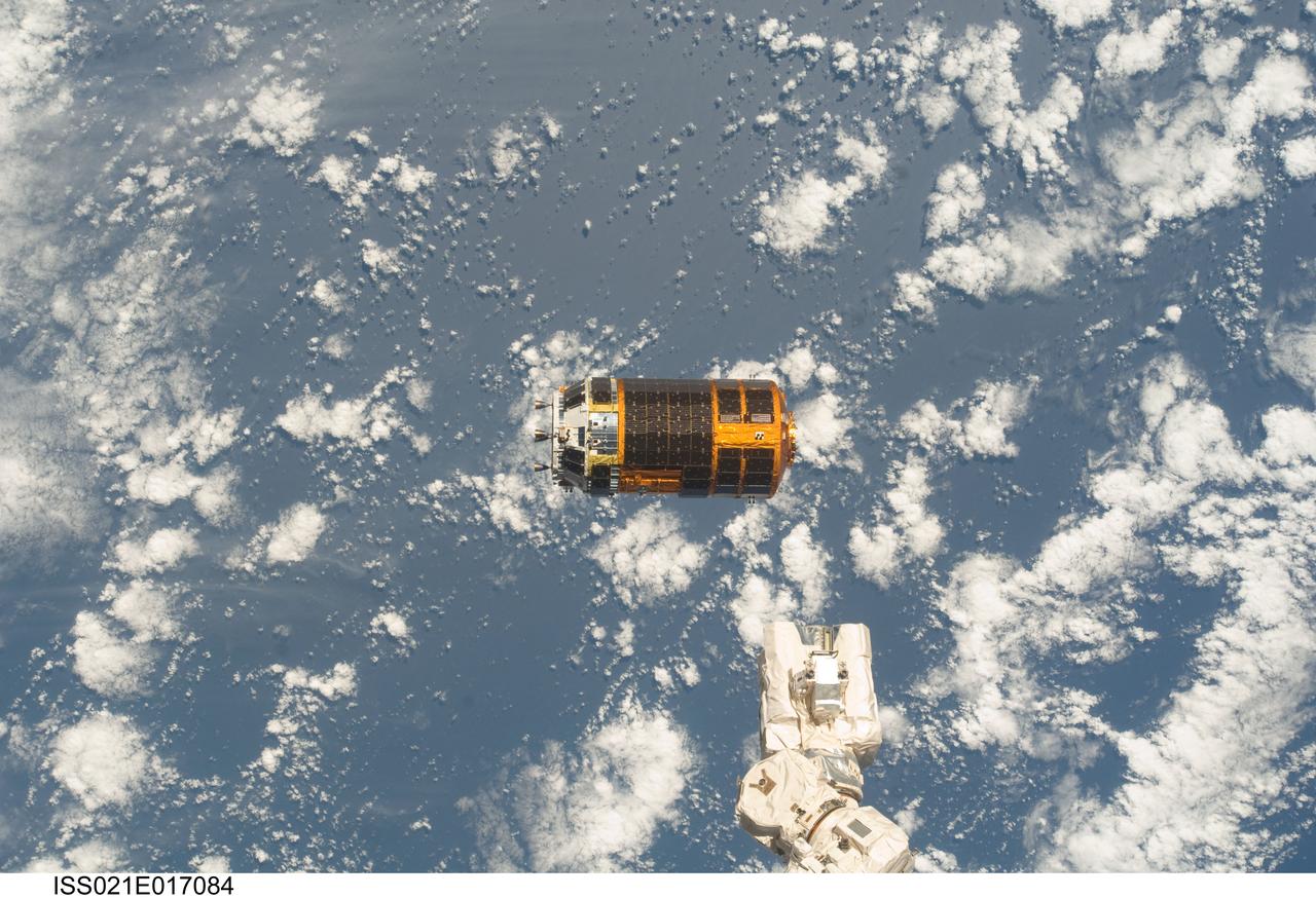 ISS021-E-017084 (30 Oct. 2009) --- Backdropped by a blue and white part of Earth, the unpiloted Japanese H-II Transfer Vehicle (HTV), filled with trash and unneeded items, departs from the International Space Station. European Space Agency astronaut Frank De Winne, Expedition 21 commander; NASA astronaut Nicole Stott and Canadian Space Agency astronaut Robert Thirsk, both flight engineers, used the station’s Canadarm2 robotic arm to grab the HTV cargo craft and unberth it from the Harmony node’s nadir port. The HTV was successfully unberthed at 10:18 a.m. (CDT) on Oct. 30, 2009, and released from the station’s Canadarm2 at 12:32 p.m.