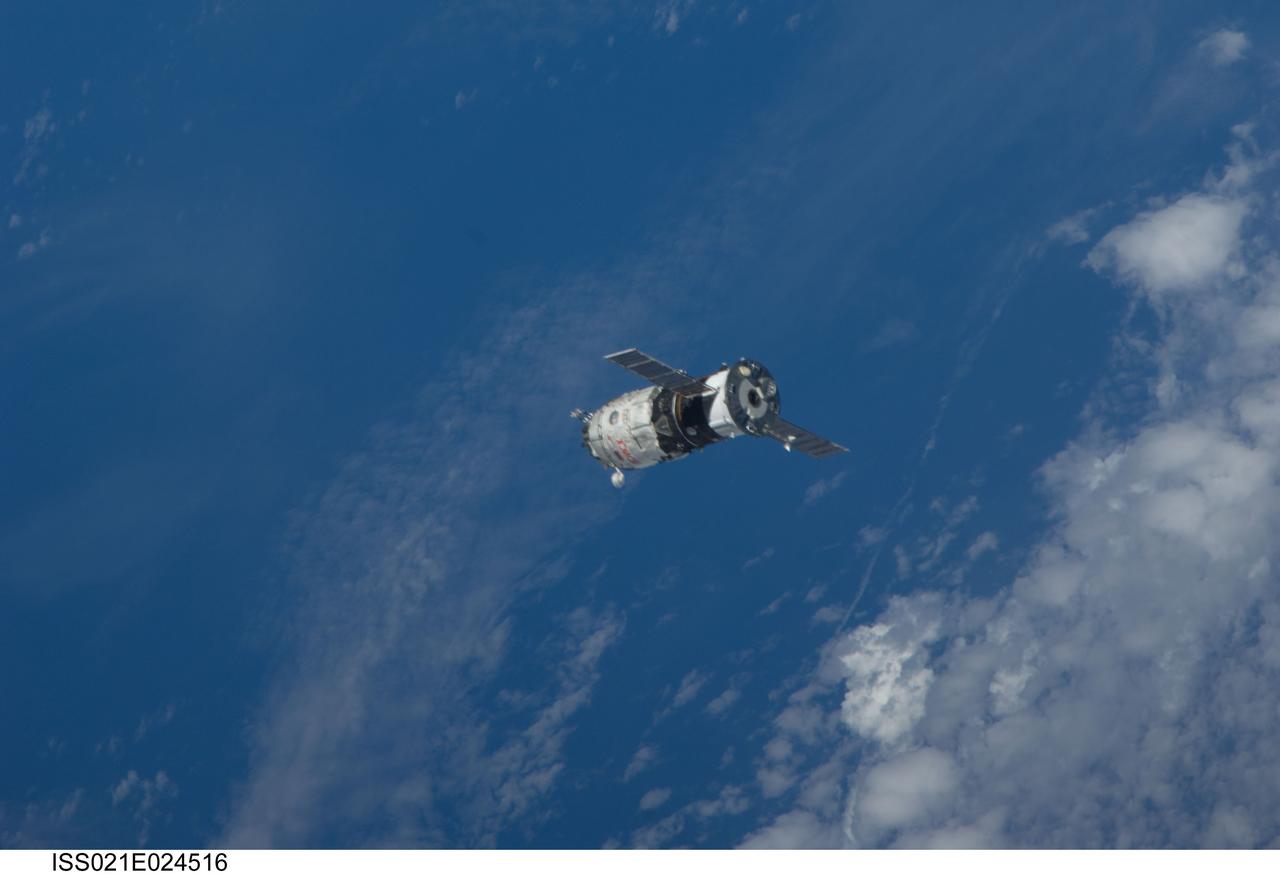 ISS021-E-024516 (12 Nov. 2009) --- Backdropped by a blue and white part of Earth, the new unpiloted Russian Mini-Research Module 2 (MRM2), also known as Poisk, approaches the International Space Station. The MRM2 docked to the space-facing port of the Zvezda Service Module at 9:41 a.m. (CST) on Nov. 12, 2009. It began its trip to the station when it was launched aboard a Soyuz rocket from the Baikonur Cosmodrome in Kazakhstan on Nov. 10. Poisk is a Russian term that translates to search, seek and explore. It will provide an additional docking port for visiting Russian spacecrafts and will serve as an extra airlock for spacewalkers wearing Russian Orlan spacesuits. Poisk joins a Russian Progress resupply vehicle and two Russian Soyuz spacecraft currently docked at the station.