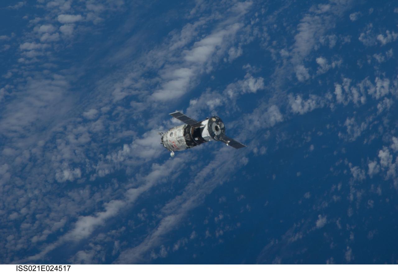 ISS021-E-024517 (12 Nov. 2009) --- Backdropped by a blue and white part of Earth, the new unpiloted Russian Mini-Research Module 2 (MRM2), also known as Poisk, approaches the International Space Station. The MRM2 docked to the space-facing port of the Zvezda Service Module at 9:41 a.m. (CST) on Nov. 12, 2009. It began its trip to the station when it was launched aboard a Soyuz rocket from the Baikonur Cosmodrome in Kazakhstan on Nov. 10. Poisk is a Russian term that translates to search, seek and explore. It will provide an additional docking port for visiting Russian spacecrafts and will serve as an extra airlock for spacewalkers wearing Russian Orlan spacesuits. Poisk joins a Russian Progress resupply vehicle and two Russian Soyuz spacecraft currently docked at the station.