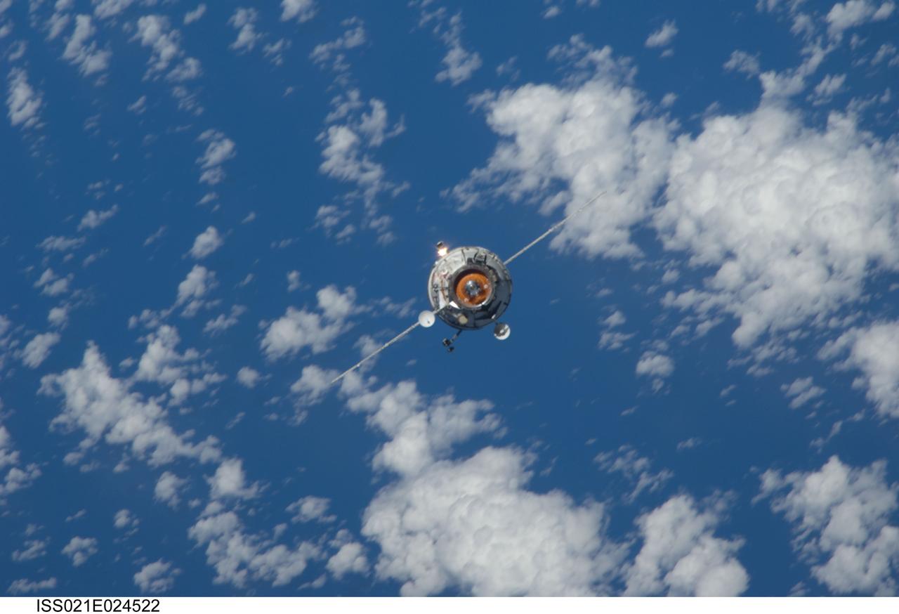 ISS021-E-024522 (12 Nov. 2009) --- Backdropped by a blue and white part of Earth, the new unpiloted Russian Mini-Research Module 2 (MRM2), also known as Poisk, approaches the International Space Station. The MRM2 docked to the space-facing port of the Zvezda Service Module at 9:41 a.m. (CST) on Nov. 12, 2009. It began its trip to the station when it was launched aboard a Soyuz rocket from the Baikonur Cosmodrome in Kazakhstan on Nov. 10. Poisk is a Russian term that translates to search, seek and explore. It will provide an additional docking port for visiting Russian spacecrafts and will serve as an extra airlock for spacewalkers wearing Russian Orlan spacesuits. Poisk joins a Russian Progress resupply vehicle and two Russian Soyuz spacecraft currently docked at the station.