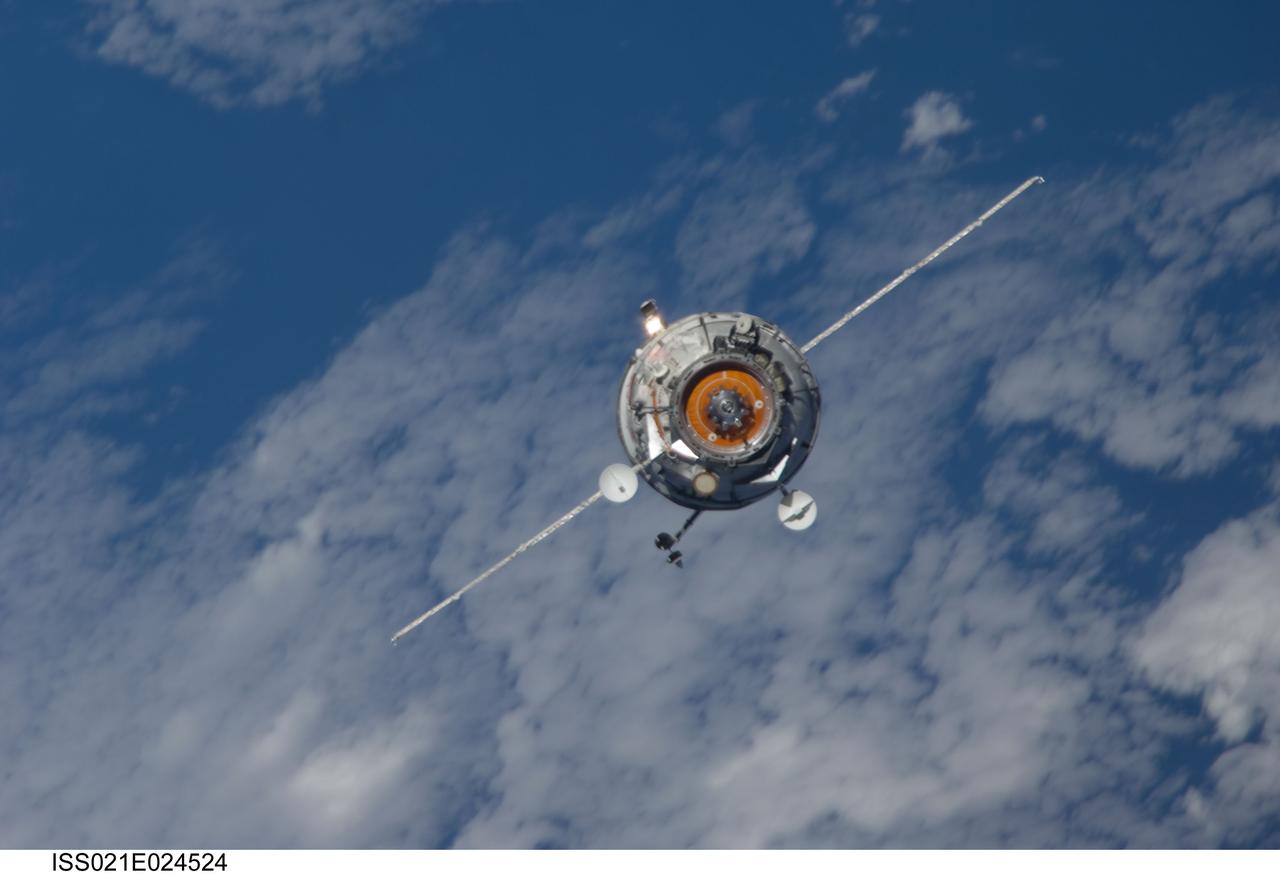 ISS021-E-024524 (12 Nov. 2009) --- Backdropped by a blue and white part of Earth, the new unpiloted Russian Mini-Research Module 2 (MRM2), also known as Poisk, approaches the International Space Station. The MRM2 docked to the space-facing port of the Zvezda Service Module at 9:41 a.m. (CST) on Nov. 12, 2009. It began its trip to the station when it was launched aboard a Soyuz rocket from the Baikonur Cosmodrome in Kazakhstan on Nov. 10. Poisk is a Russian term that translates to search, seek and explore. It will provide an additional docking port for visiting Russian spacecrafts and will serve as an extra airlock for spacewalkers wearing Russian Orlan spacesuits. Poisk joins a Russian Progress resupply vehicle and two Russian Soyuz spacecraft currently docked at the station.