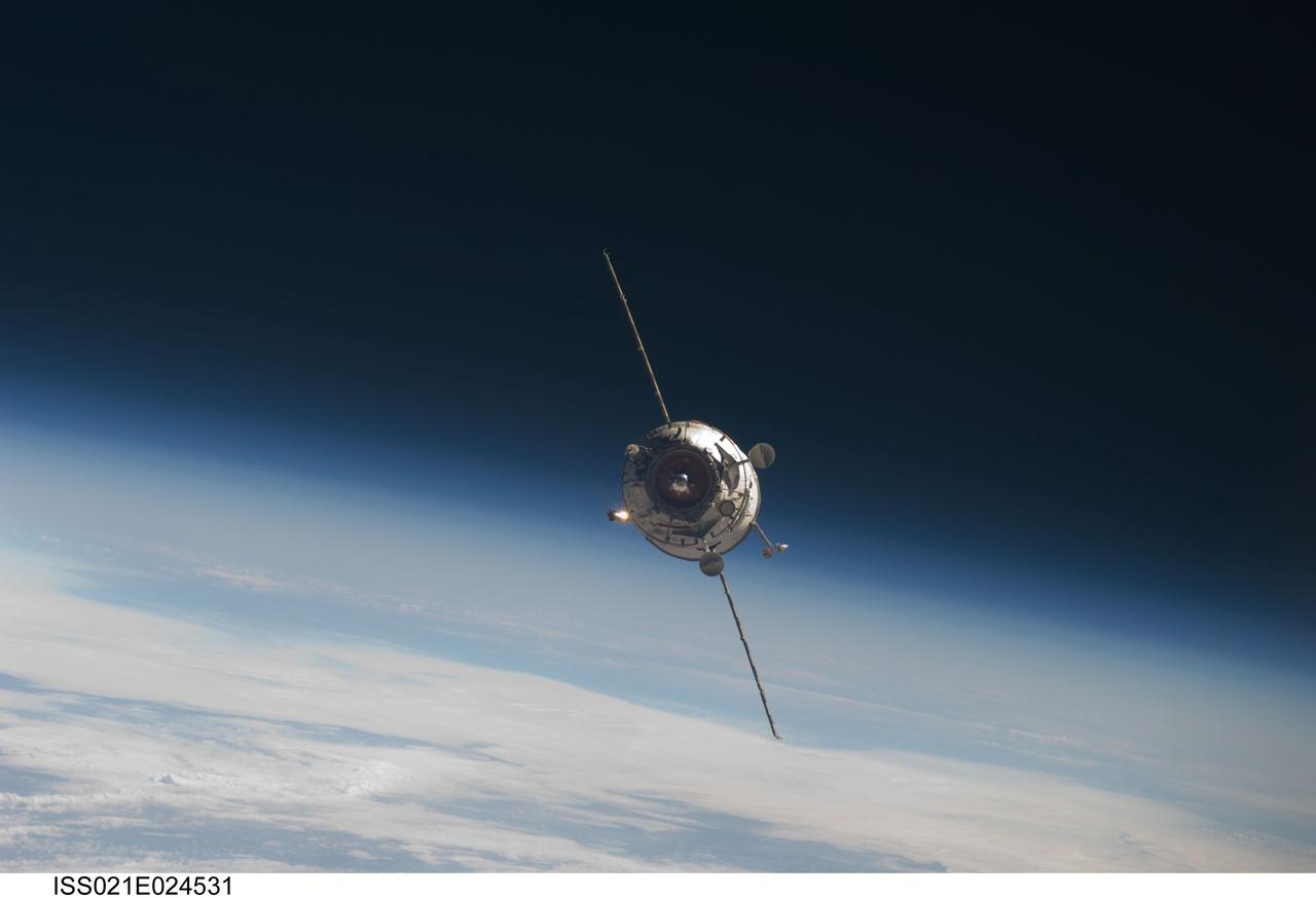 ISS021-E-024531 (12 Nov. 2009) --- Backdropped by Earth’s horizon and the blackness of space, the new unpiloted Russian Mini-Research Module 2 (MRM2), also known as Poisk, approaches the International Space Station. The MRM2 docked to the space-facing port of the Zvezda Service Module at 9:41 a.m. (CST) on Nov. 12, 2009. It began its trip to the station when it was launched aboard a Soyuz rocket from the Baikonur Cosmodrome in Kazakhstan on Nov. 10. Poisk is a Russian term that translates to search, seek and explore. It will provide an additional docking port for visiting Russian spacecrafts and will serve as an extra airlock for spacewalkers wearing Russian Orlan spacesuits. Poisk joins a Russian Progress resupply vehicle and two Russian Soyuz spacecraft currently docked at the station.